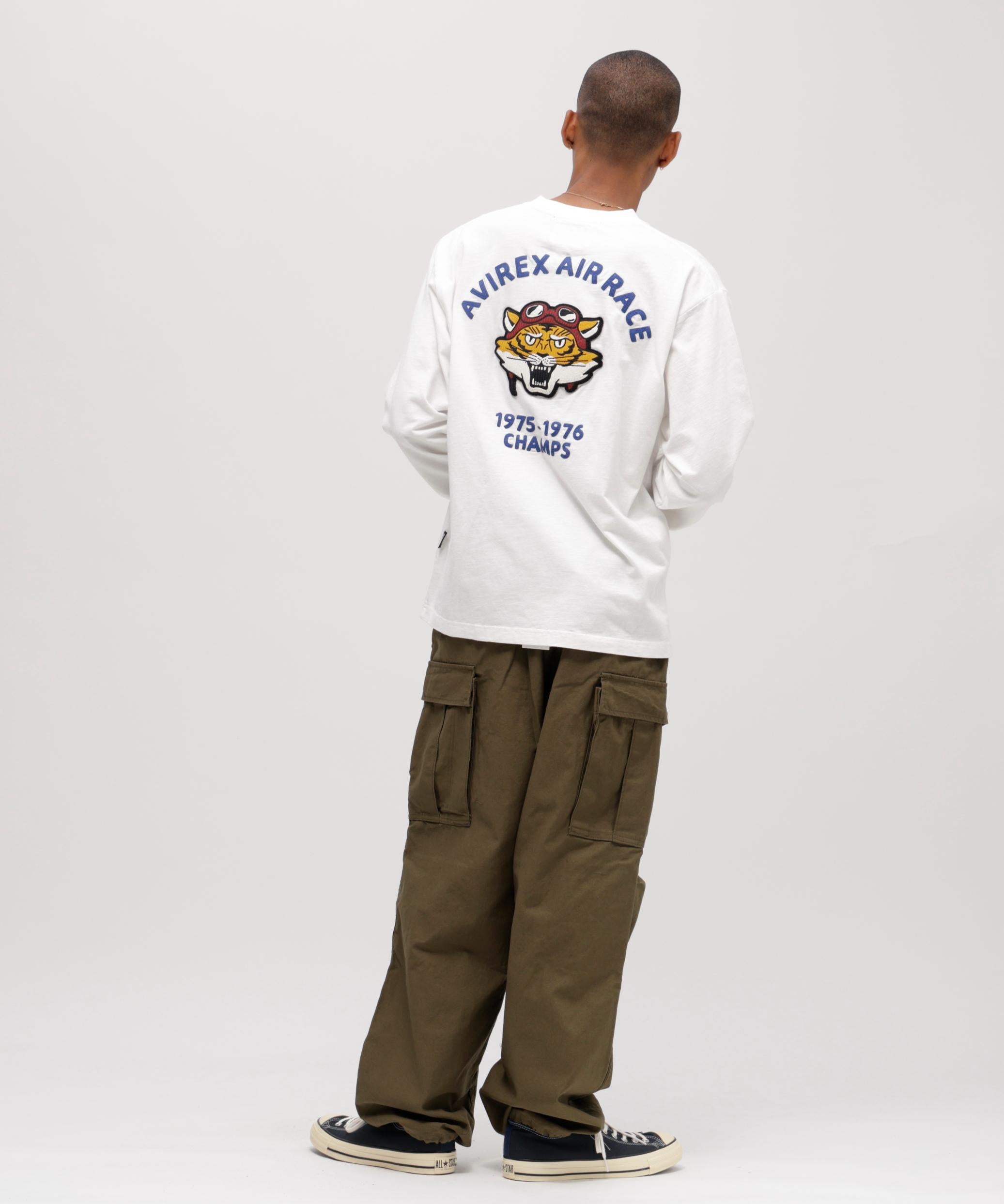 《A.A.>.C》TIGE> CHAMPS SLUR L/S T-SHI>T ホワイト
