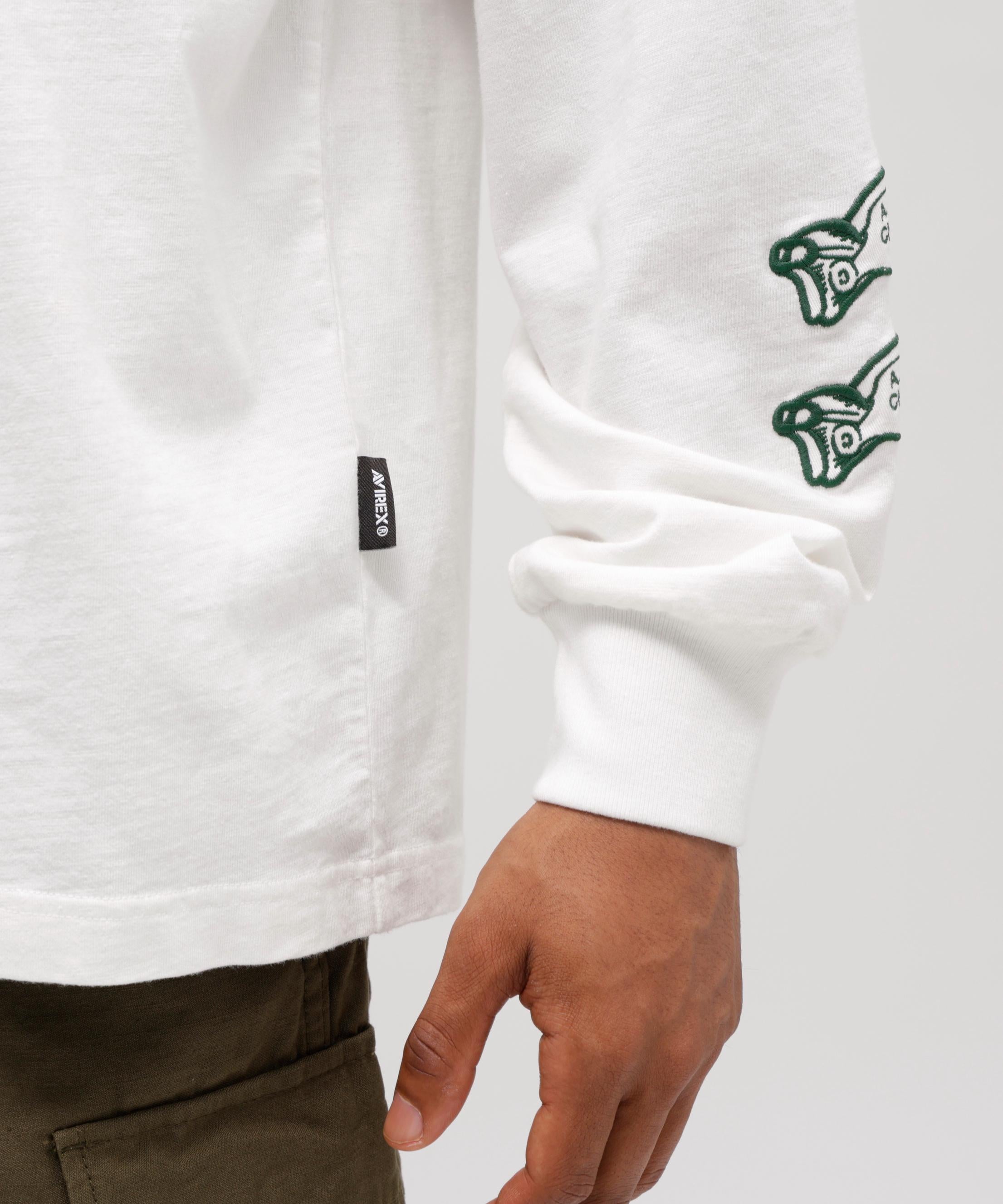 《A.A.>.C》TIGE> CHAMPS SLUR L/S T-SHI>T ホワイト