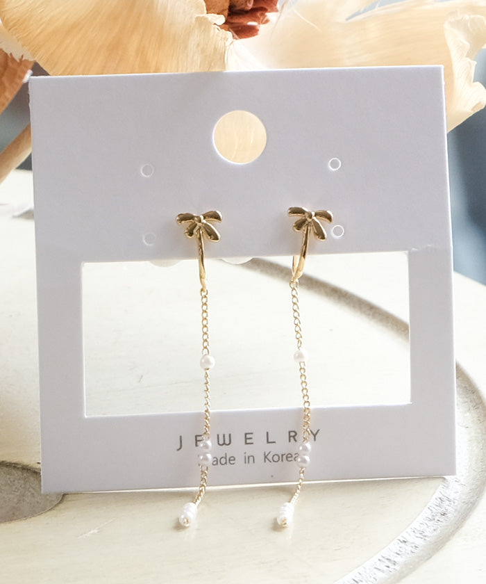 アクアガレージ aquagarage リボンパールスイングイヤリング レディース (ゴールド) ゴールド