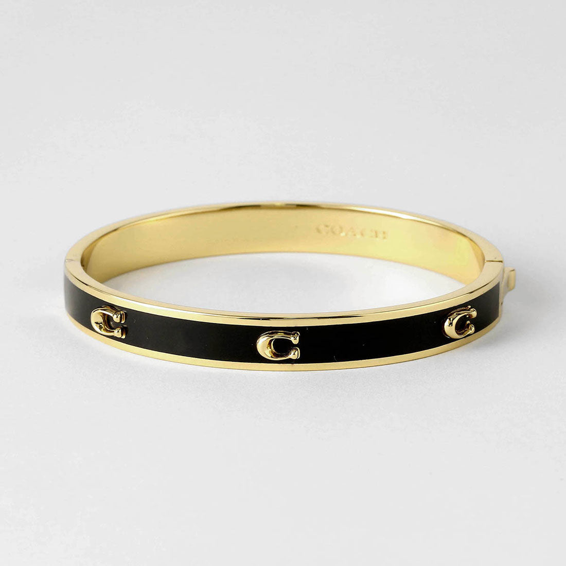 コーチ COACH ブレスレット ペグド シグネチャー ヒンジド バングル 422719 GLD001 (ブラック/ゴールド) ブラック/ゴールド