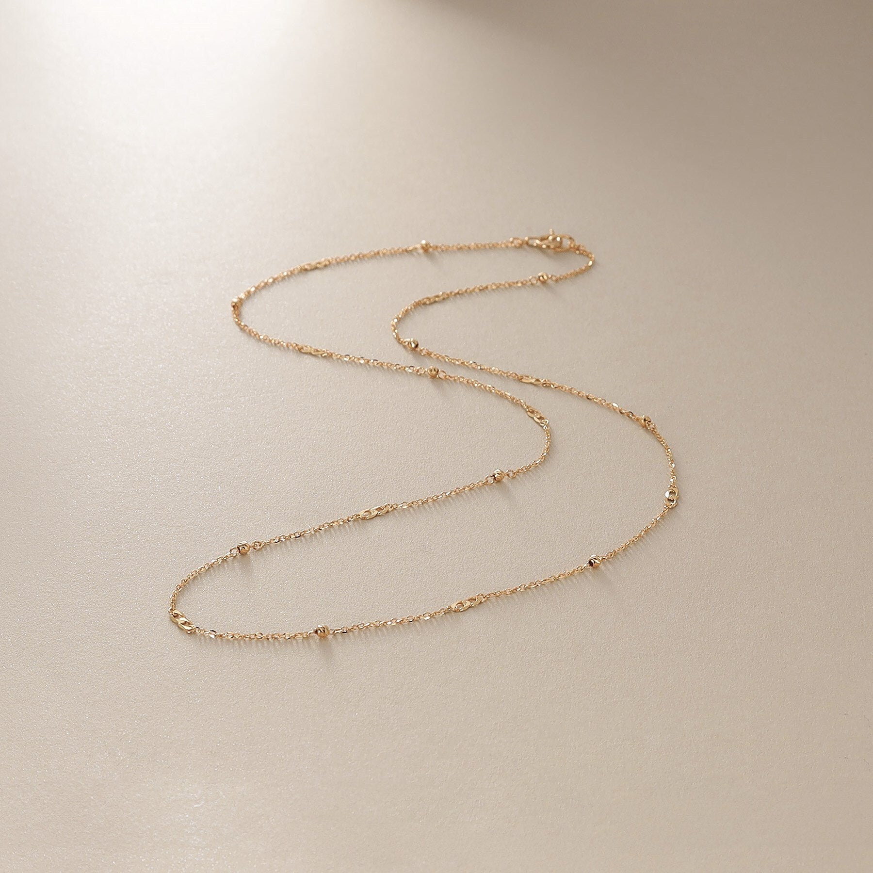 ココシュニック COCOSHNIK K18フラットキヘイ×ハニーカットビーズ ネックレス (イエローゴールド(100)) イエローゴールド(100)