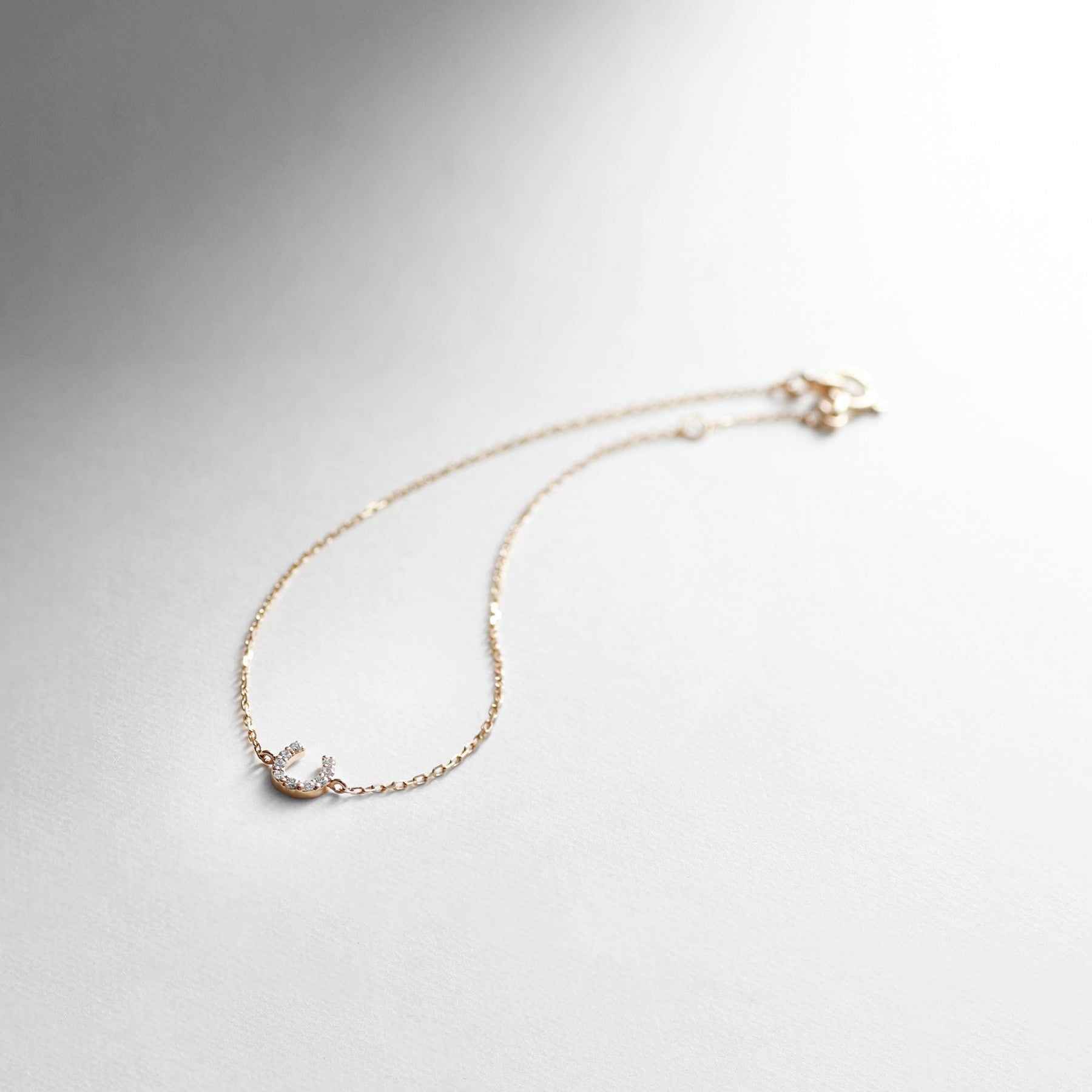 ココシュニック COCOSHNIK K10ダイヤモンド馬蹄モチーフ ブレスレット イエローゴールド(104)