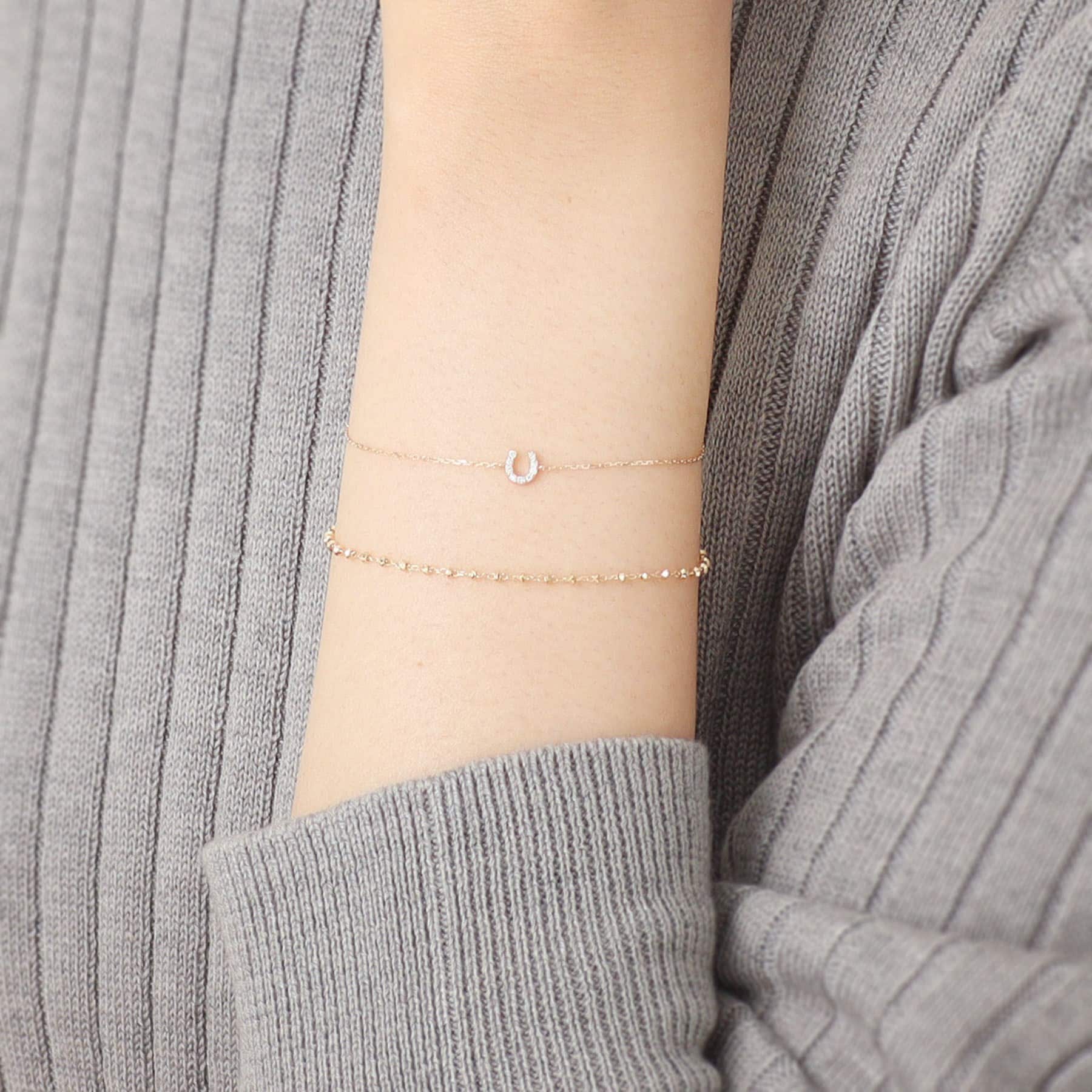 ココシュニック COCOSHNIK K10ダイヤモンド馬蹄モチーフ ブレスレット イエローゴールド(104)