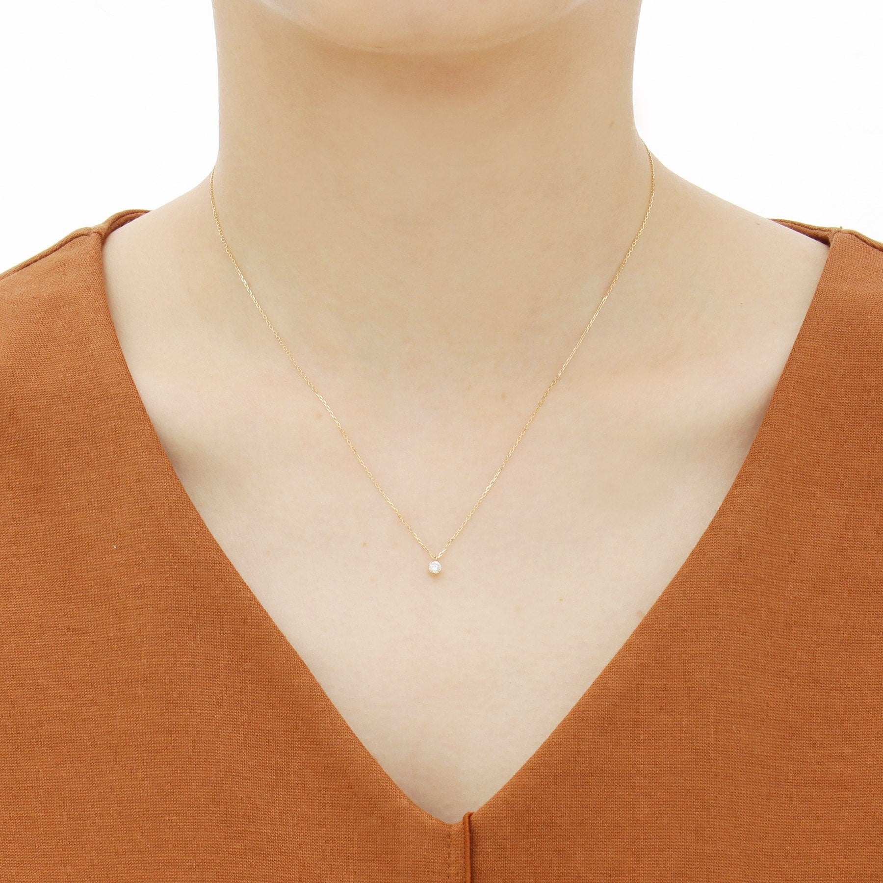 ココシュニック COCOSHNIK K18ダイヤモンド シークレット留め スルーネックレス (イエローゴールド) イエローゴールド(104)