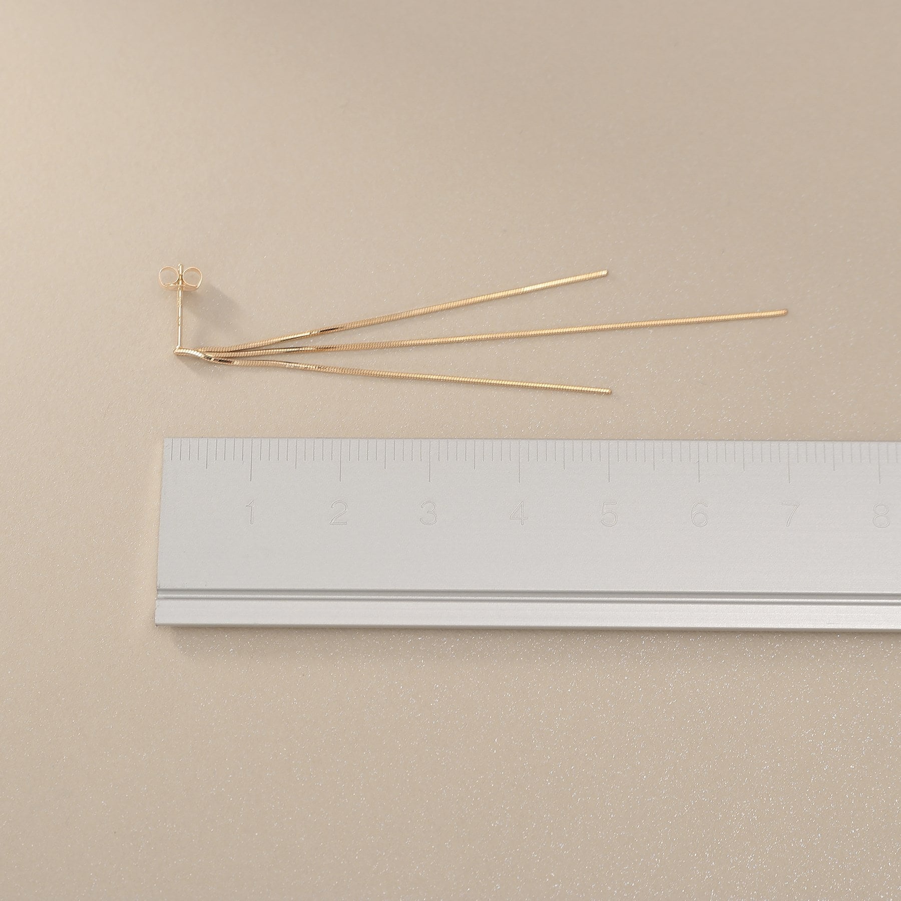 ココシュニック COCOSHNIK K10コンパクトチェーン フリンジ スタッドピアス イエローゴールド(100)