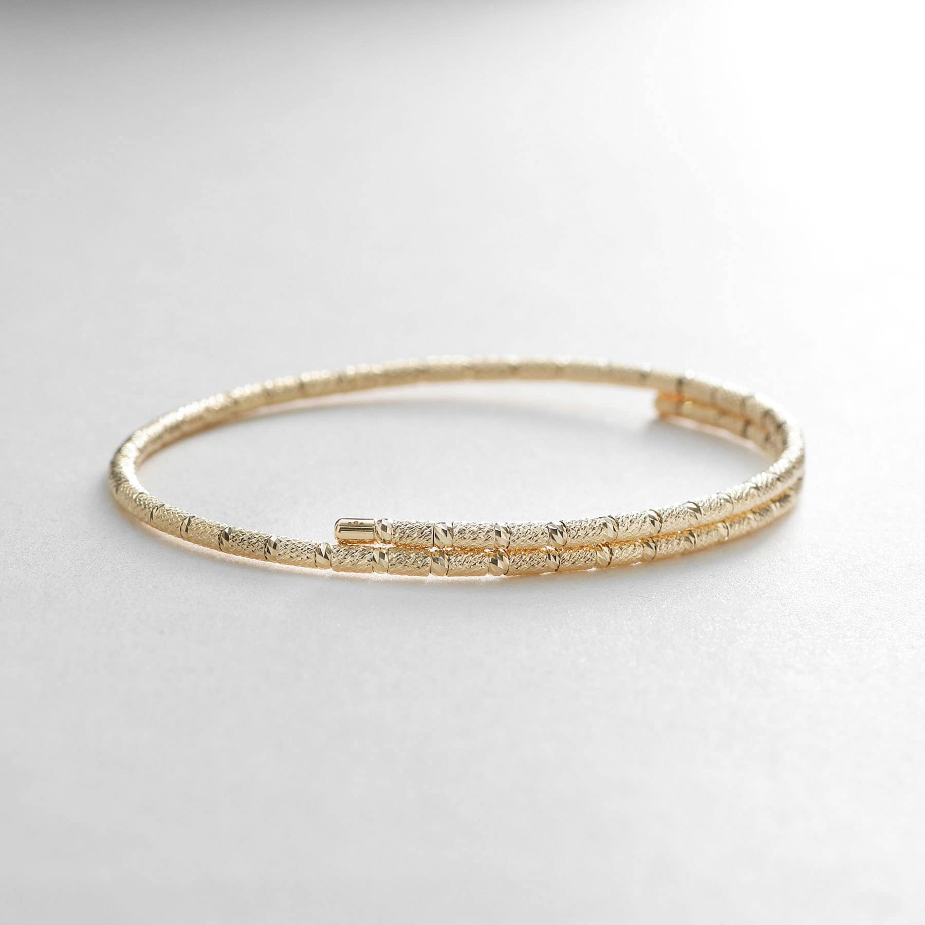 ココシュニック COCOSHNIK K10テクスチャーボール マグネットバングル イエローゴールド(100)