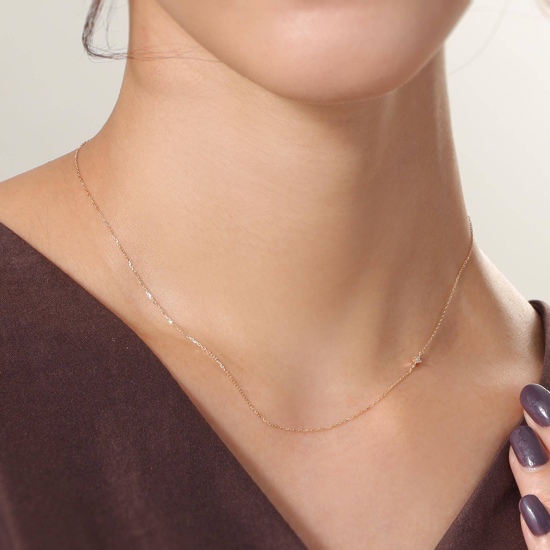 ココシュニック COCOSHNIK K10ダイヤモンド爪留め アシンメトリーネックレス イエローゴールド(104)