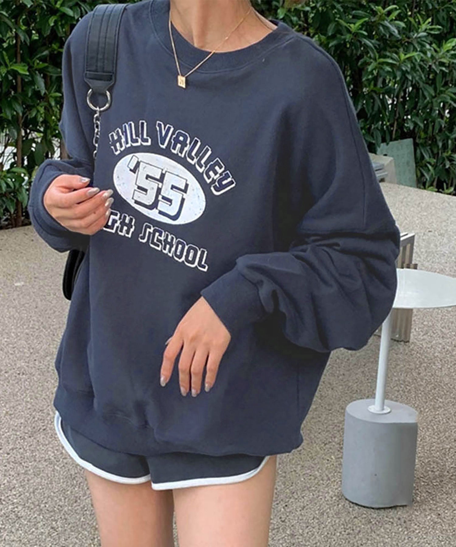 ニナエリナ Nina et Lina 裏毛 HILL VALLEY HIGH SCHOOL 英字ロゴトレーナー (グレー) グレー