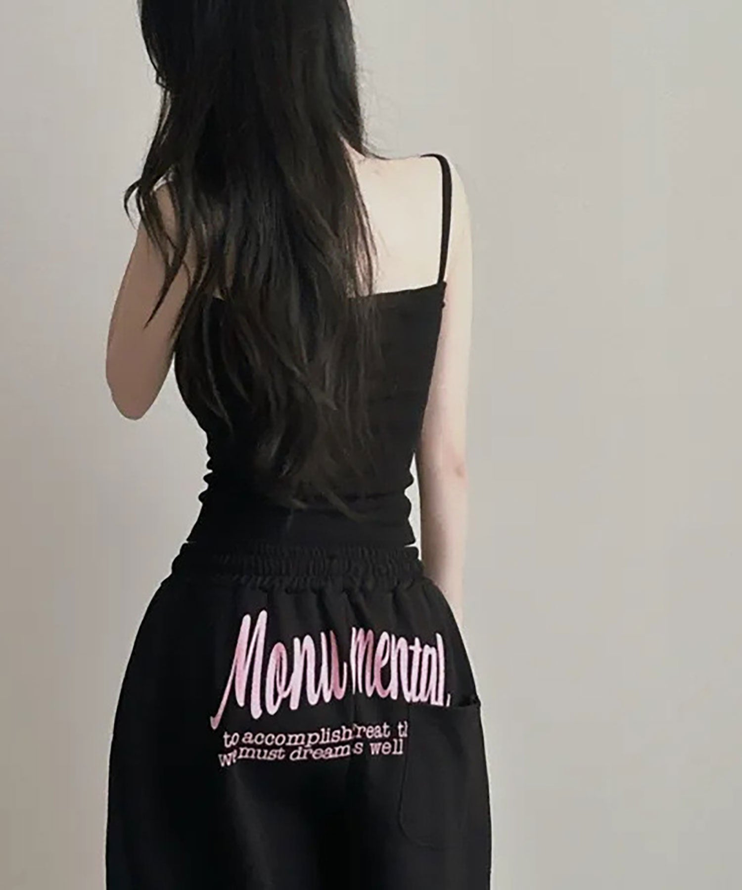 ニナエリナ Nina et Lina バックプリントスウェットパンツ (ブラック) ブラック