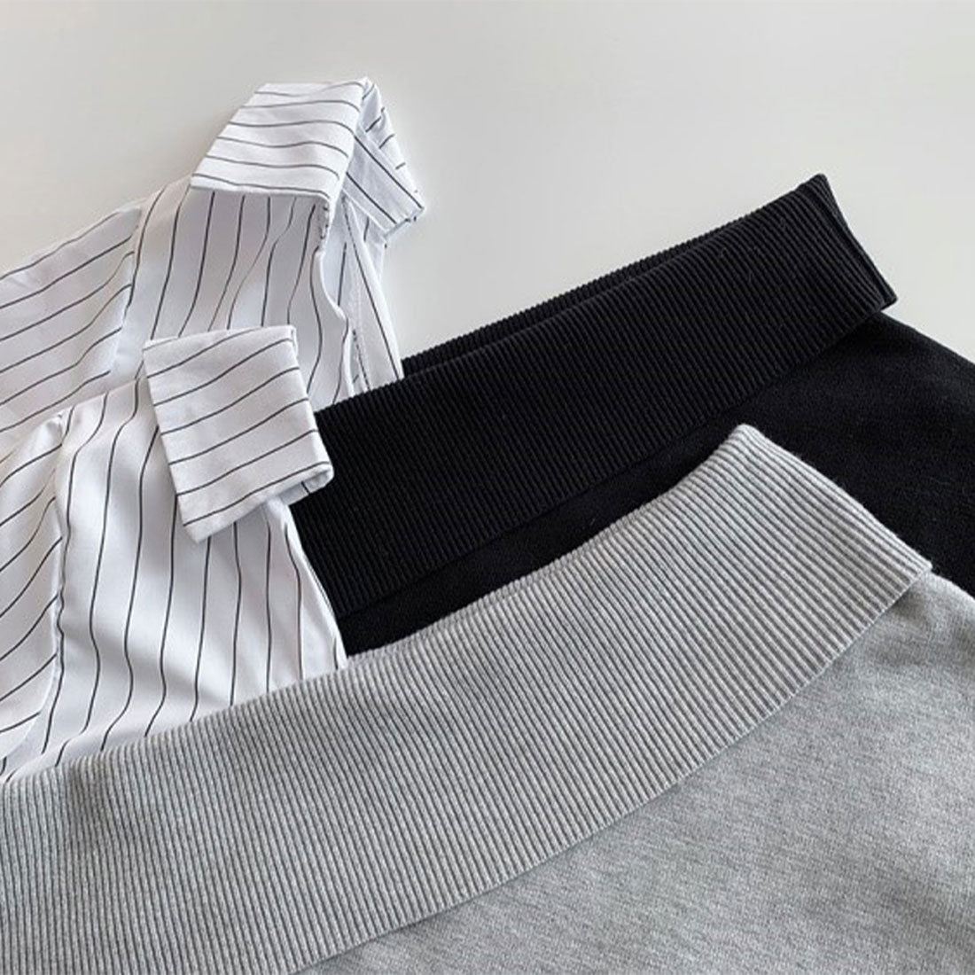 デューリリー Dewlily 切り替えアシンメトリートップス 秋 冬 韓国ファッション 10代 20代 30代 レディース 可愛い 大人カジュアル シンプル 個性的デザイン 異素材