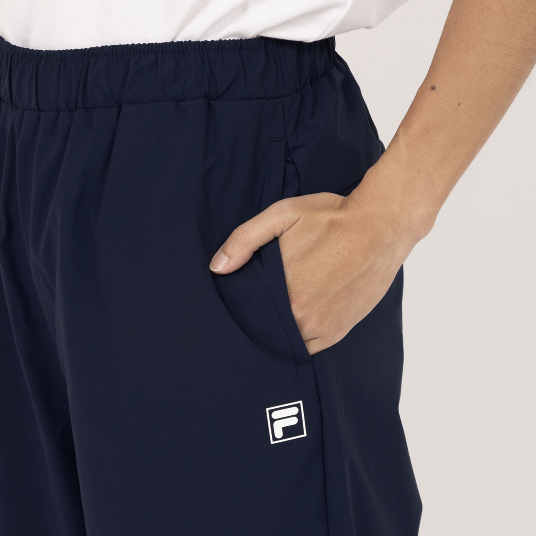 フィラ FILA 【IMP.佐藤新さん着用】WIND TRACK PANTS / ウィンドトラックパンツ / メンズ (ネイビー) ネイビー