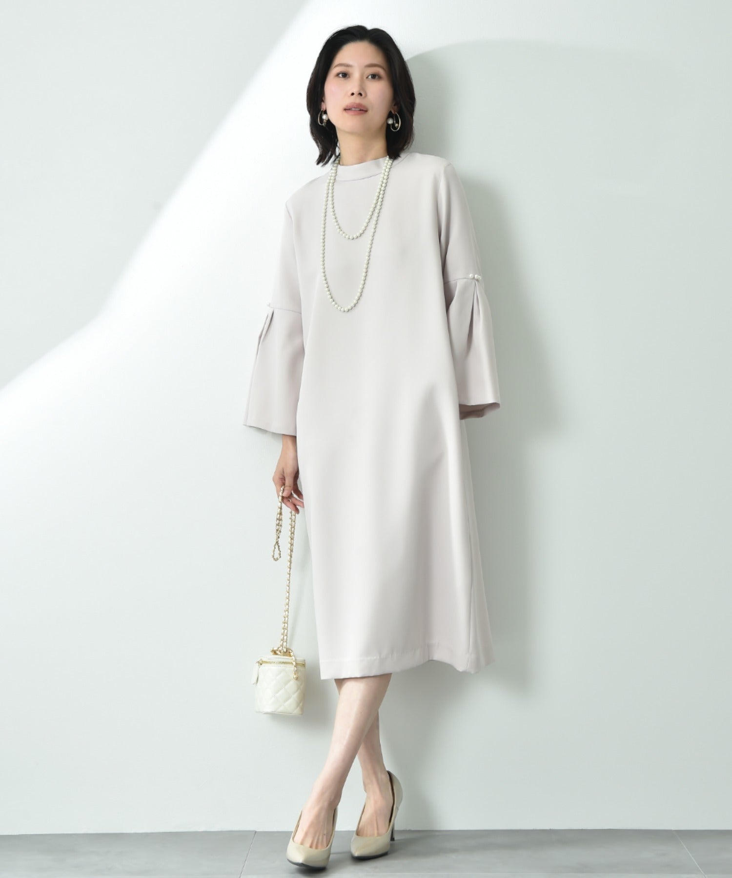 インタープラネット INTERPLANET 【マシーンウォッシャブル】ダブルクロス袖パール釦ワンピース