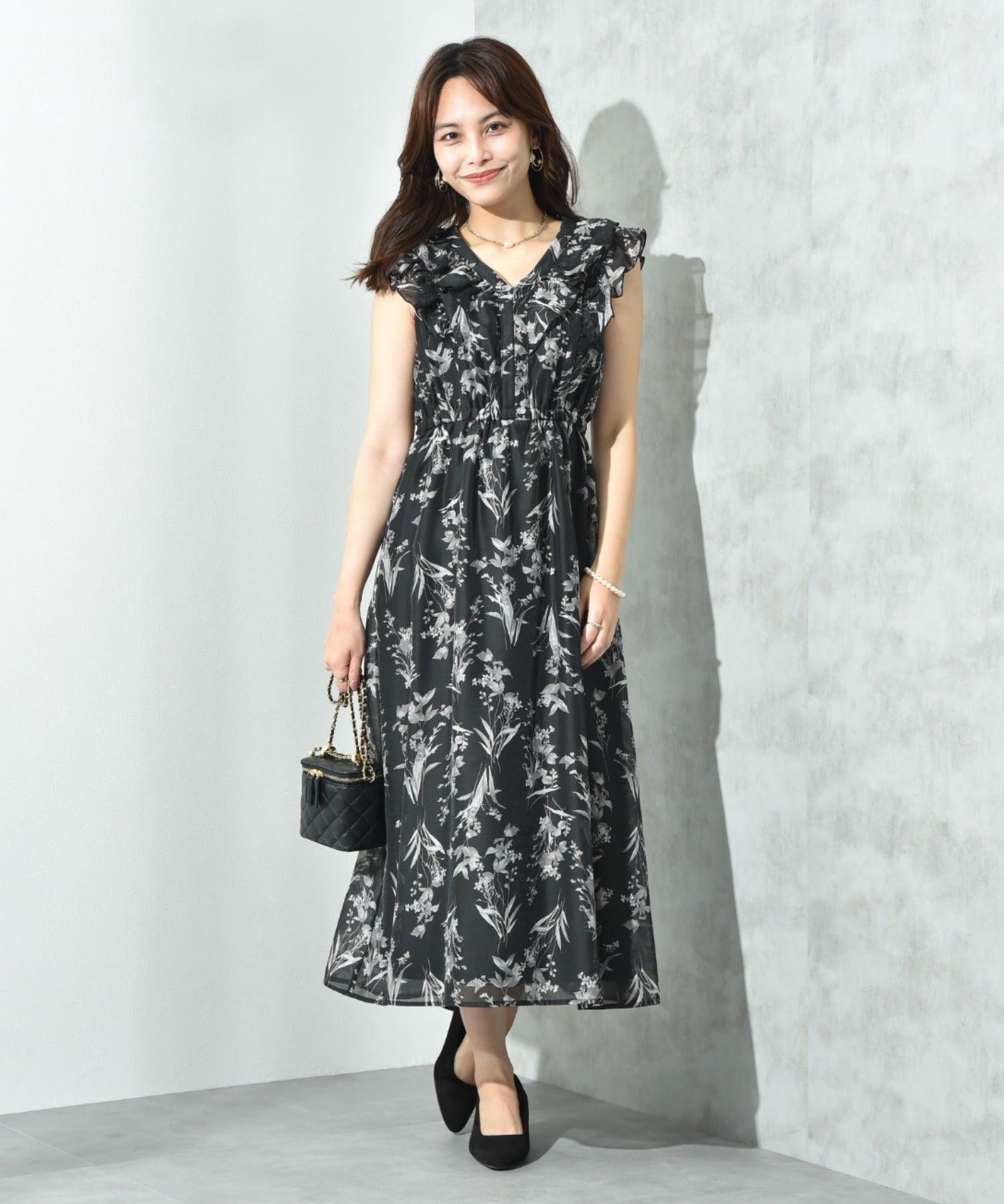 インタープラネット INTERPLANET シアー単色フラワープリントフリルワンピース (花柄 ブラック) 花柄 ブラック