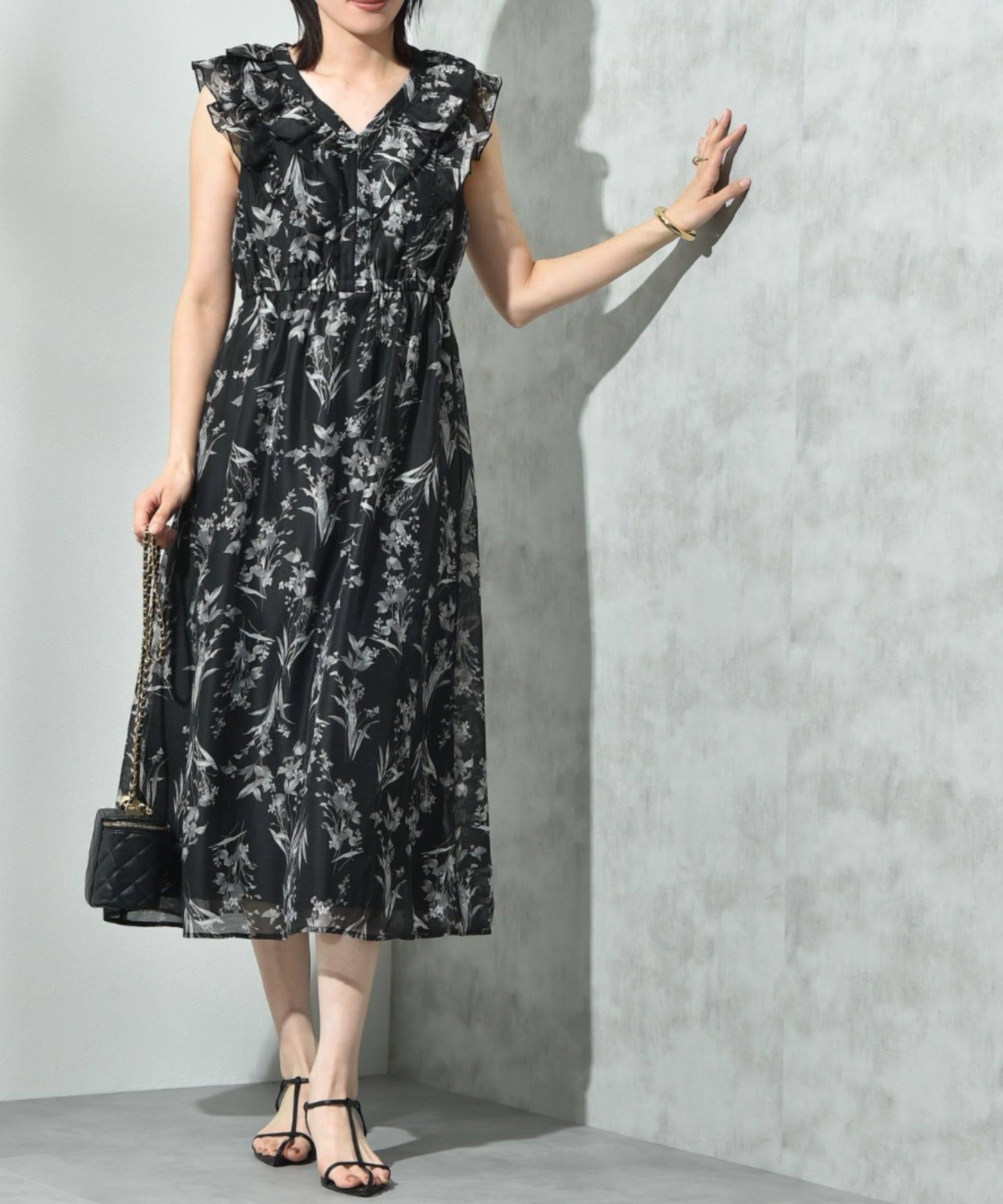 インタープラネット INTERPLANET シアー単色フラワープリントフリルワンピース (花柄 ブラック) 花柄 ブラック