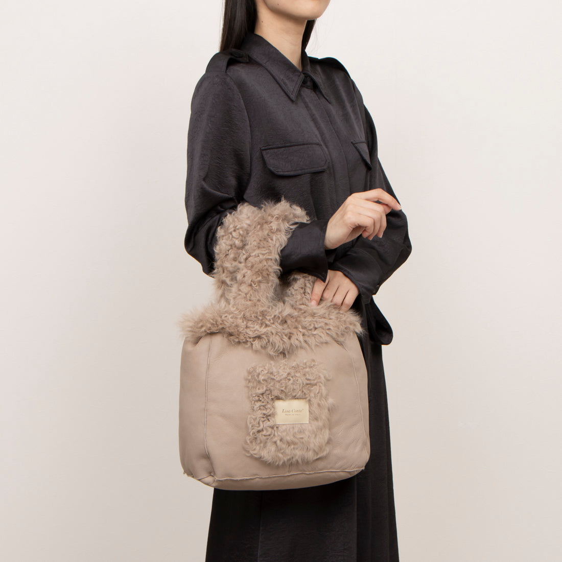 '莉莎·孔特 Lisa Conte' 可翻轉羊毛包