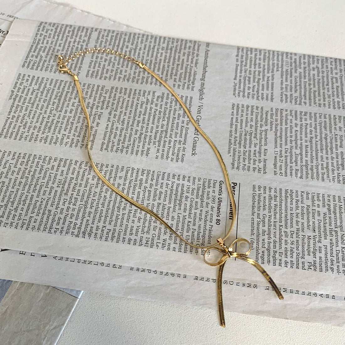 ノンヘッジ non-hedge チェーンリボンネックレス (ゴールド) ゴールド