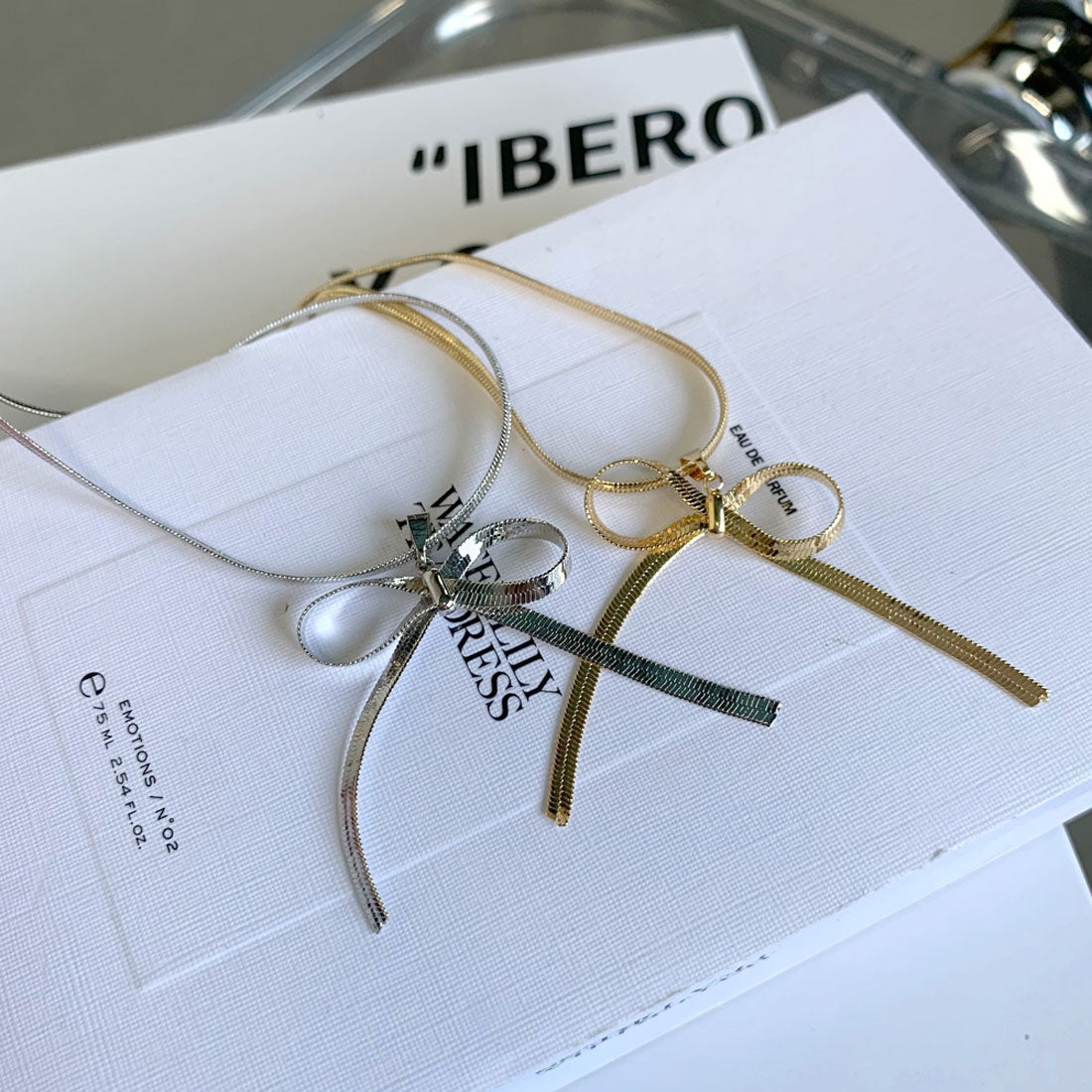 ノンヘッジ non-hedge チェーンリボンネックレス (ゴールド) ゴールド