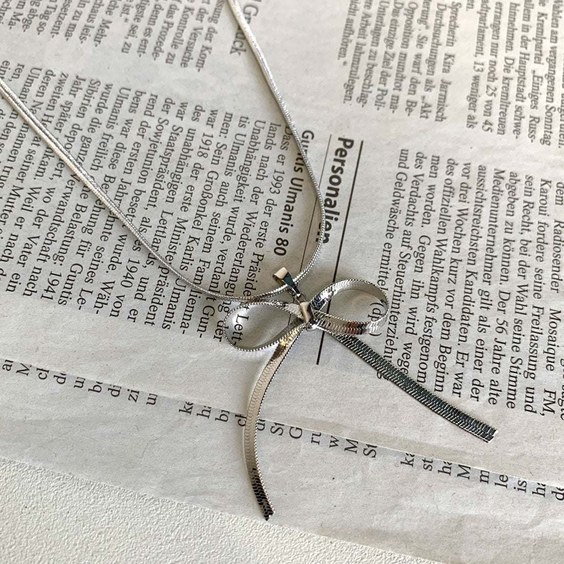 ノンヘッジ non-hedge チェーンリボンネックレス (ゴールド) ゴールド