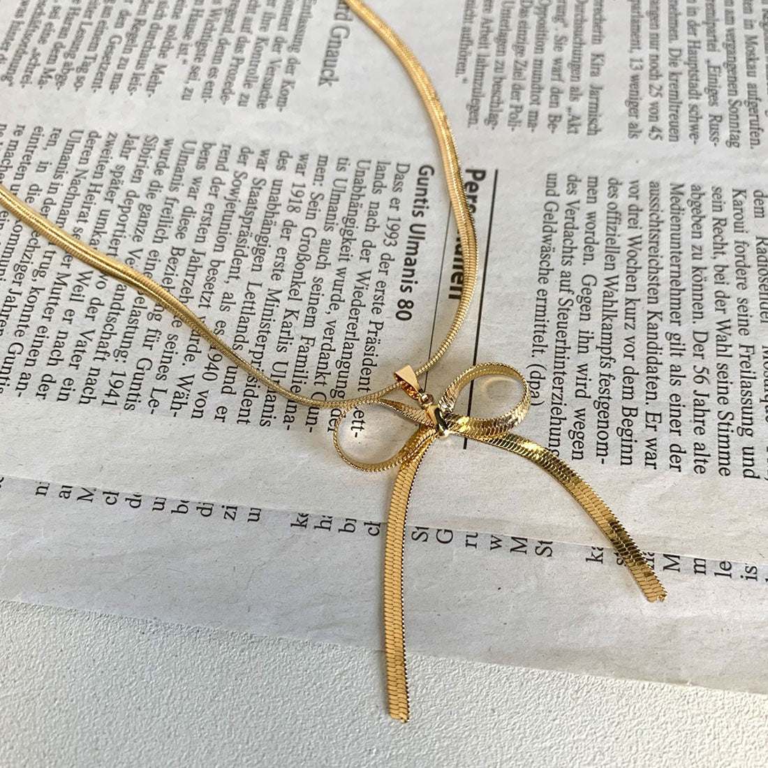 ノンヘッジ non-hedge チェーンリボンネックレス (ゴールド) ゴールド