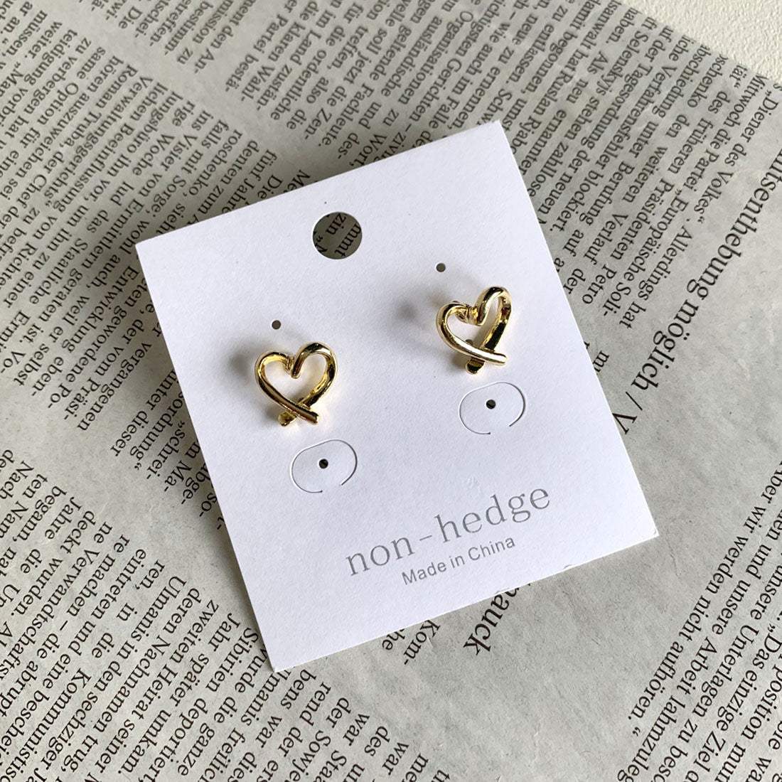 ノンヘッジ non-hedge ミニハートピアス (ゴールド) ゴールド