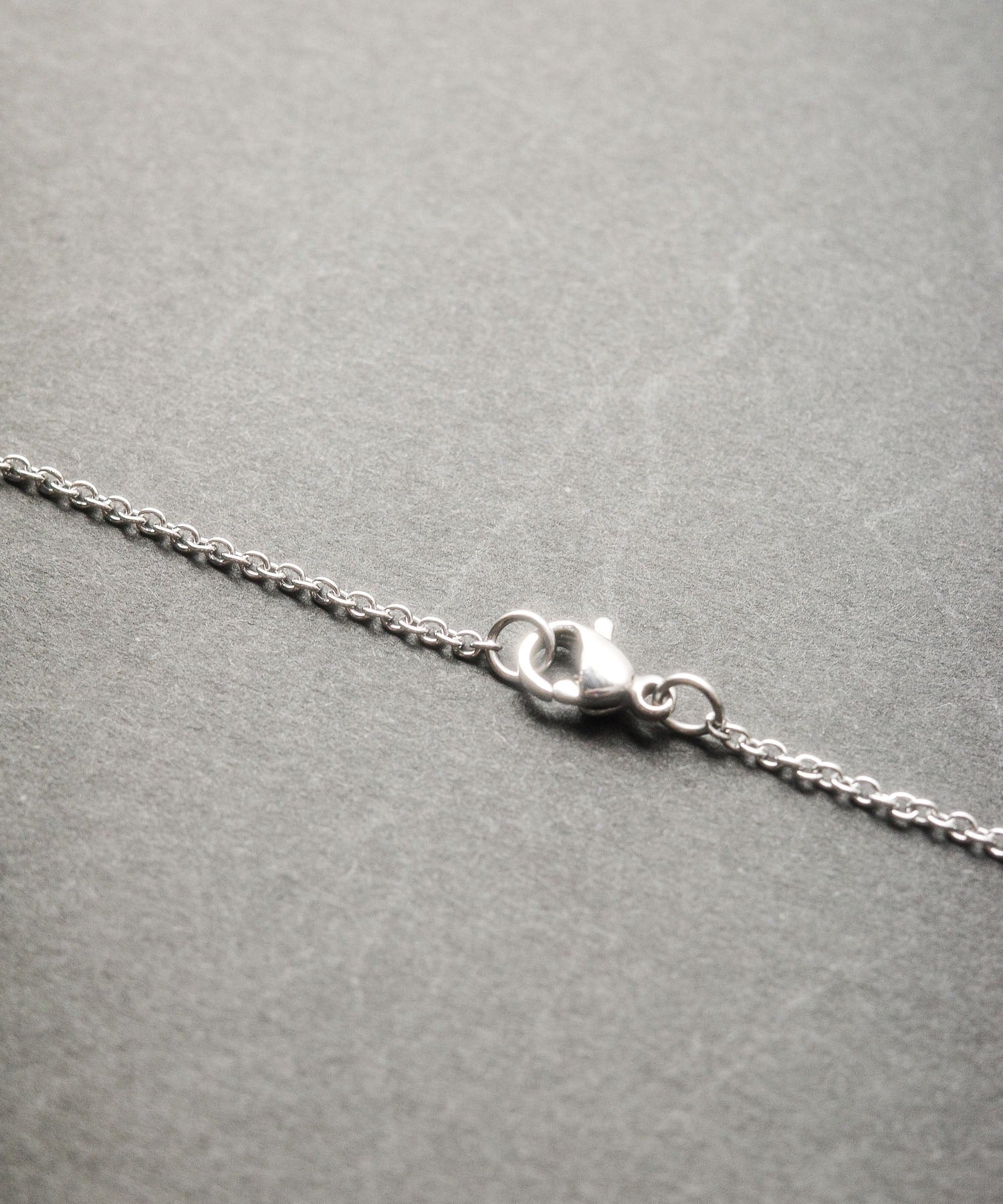 エーアールエムジー ar/mg ステンレスクロスデザインネックレス (ゴールド) ゴールド