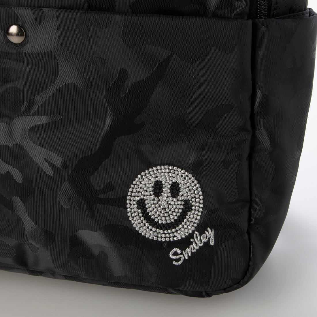 スマイリーフェイス SMILEY FACE スマイル刺繍バッグパック (カモフラージュブラック) カモフラージュブラック
