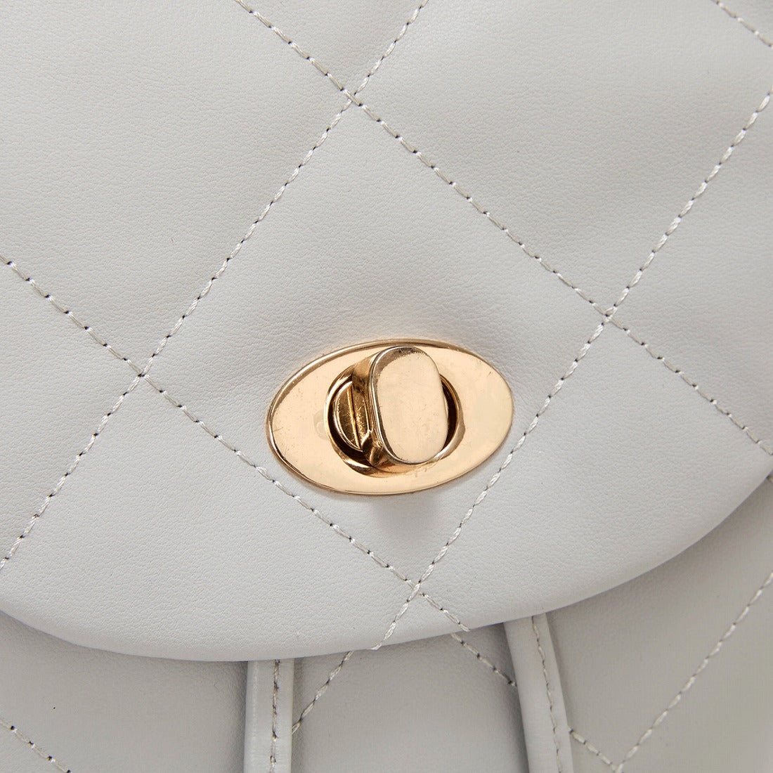 TOPKAPI TOPKAPI Soft Leather Quilted Mini Backpack with Chain