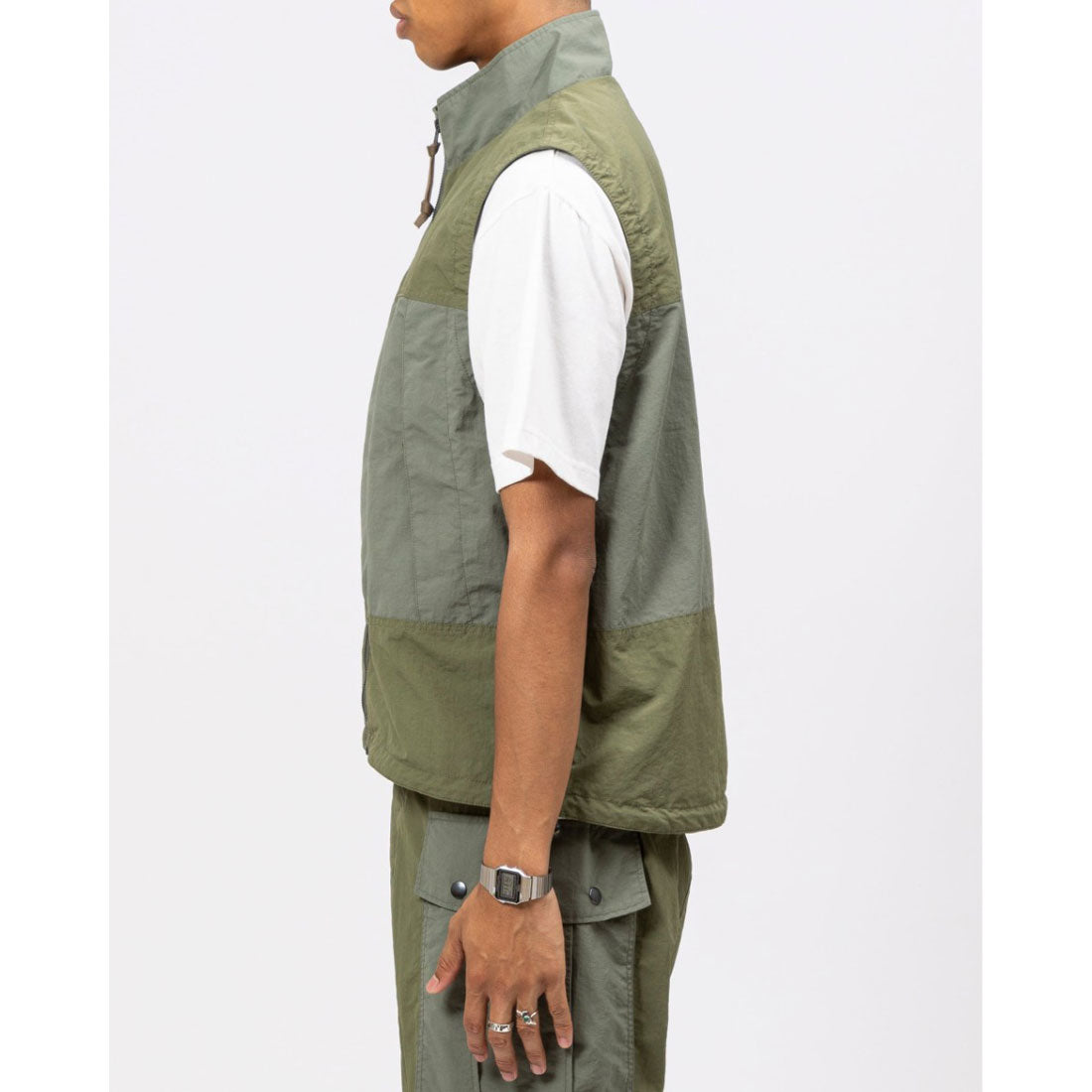 ユニフォームアウトドアスタンダード UNFRM OUTDOOR STANDARD UNFRM OUTDOOR STANDARD PACKABLE RIPSTOP STAND COLLAR VEST (ユニフォーム アウトドアスタンダード パッカブル リップストップ スタンドカラーベ (OLIVE) OLIVE