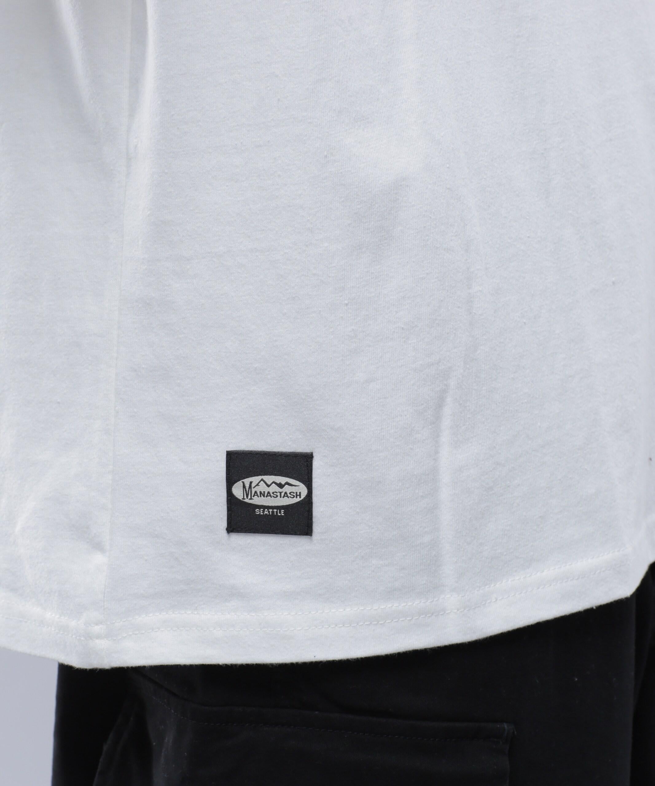 MANASTASH/マナスタッシュ/>E:CTN TEE HAPPY HOU> ホワイト