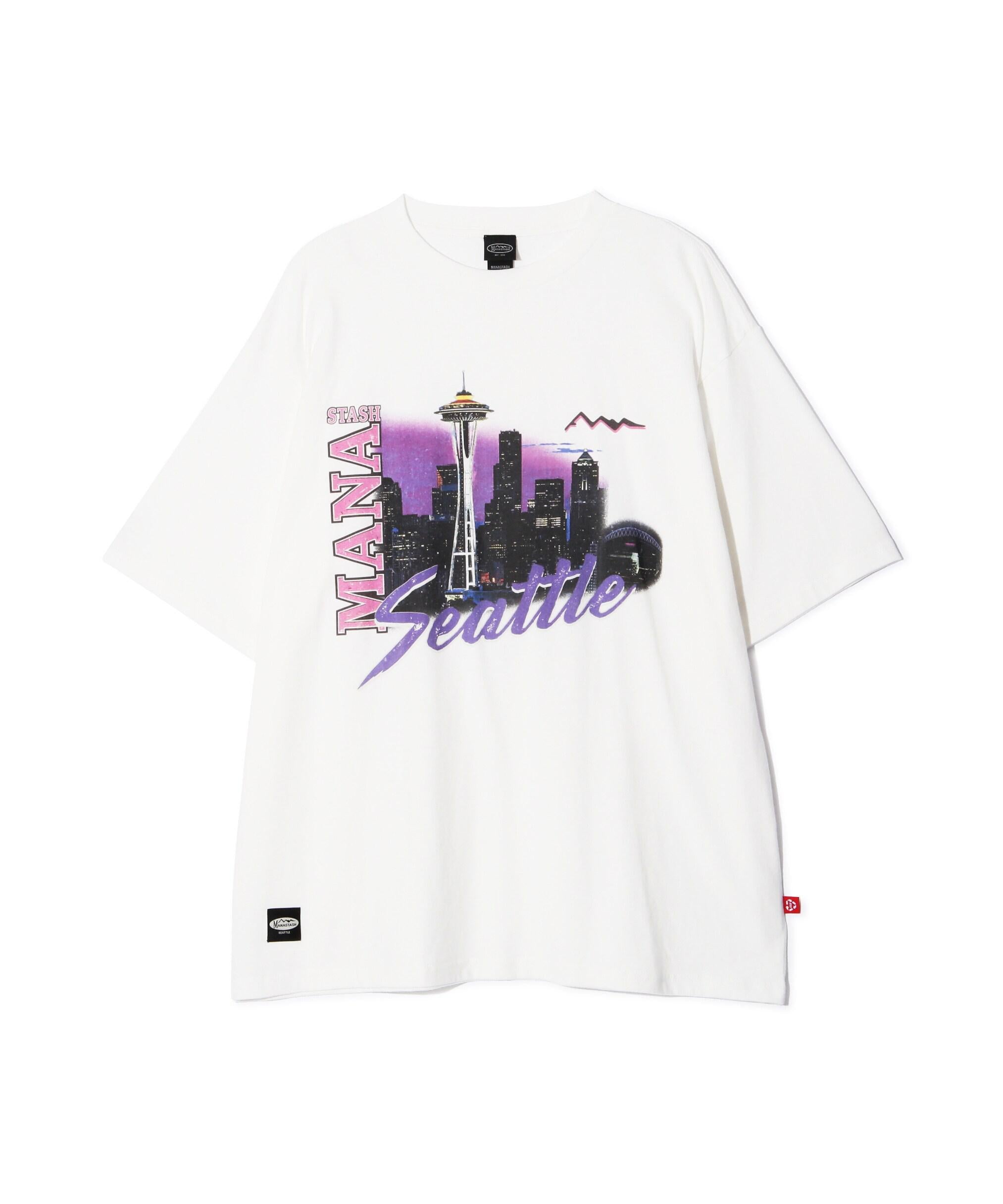 MANASTASH/マナスタッシュ/>E:CTN TEE HAPPY HOU> ホワイト