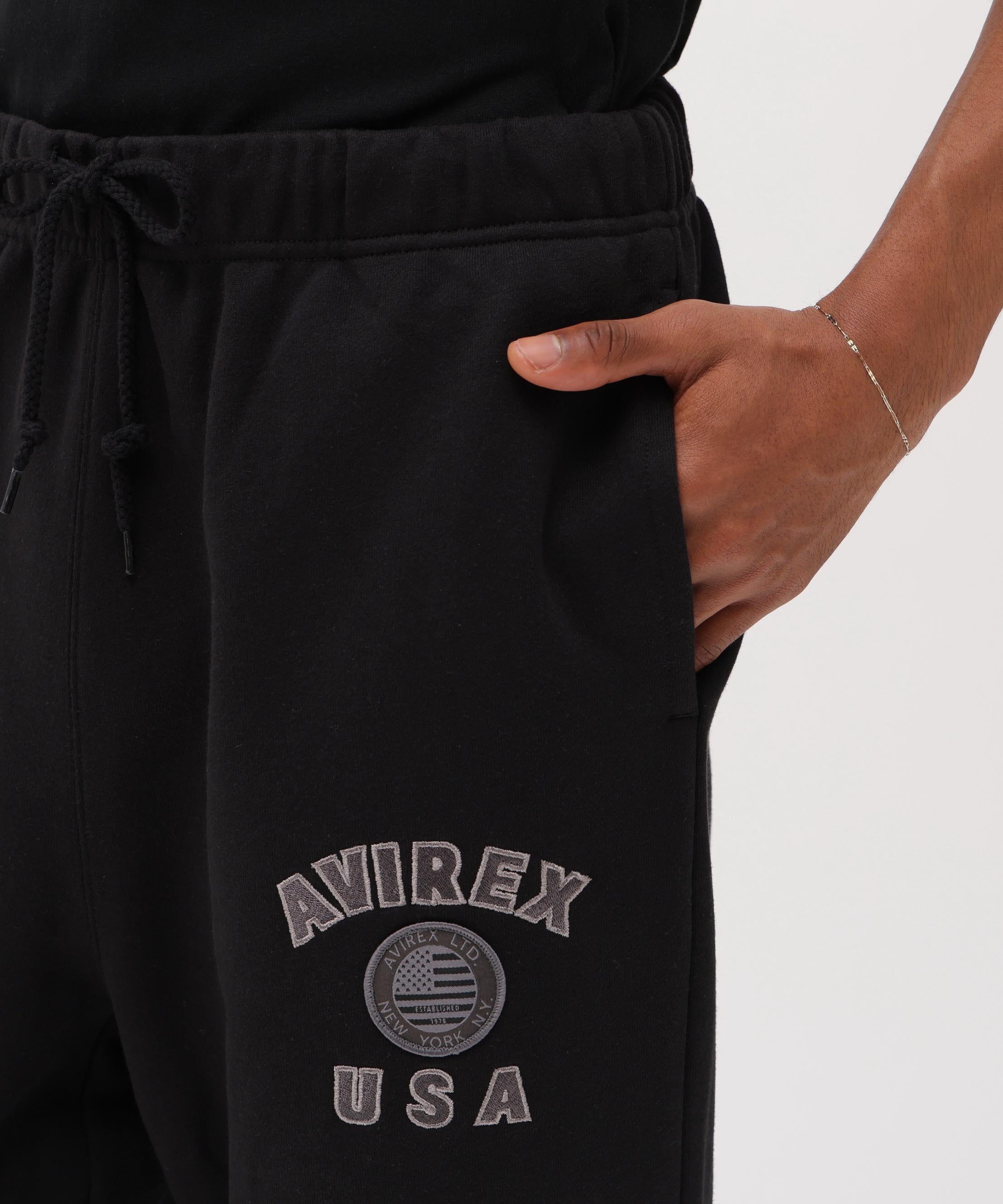 《直営店限定》VARSITY FLAG SWEAT PANTS ブラック