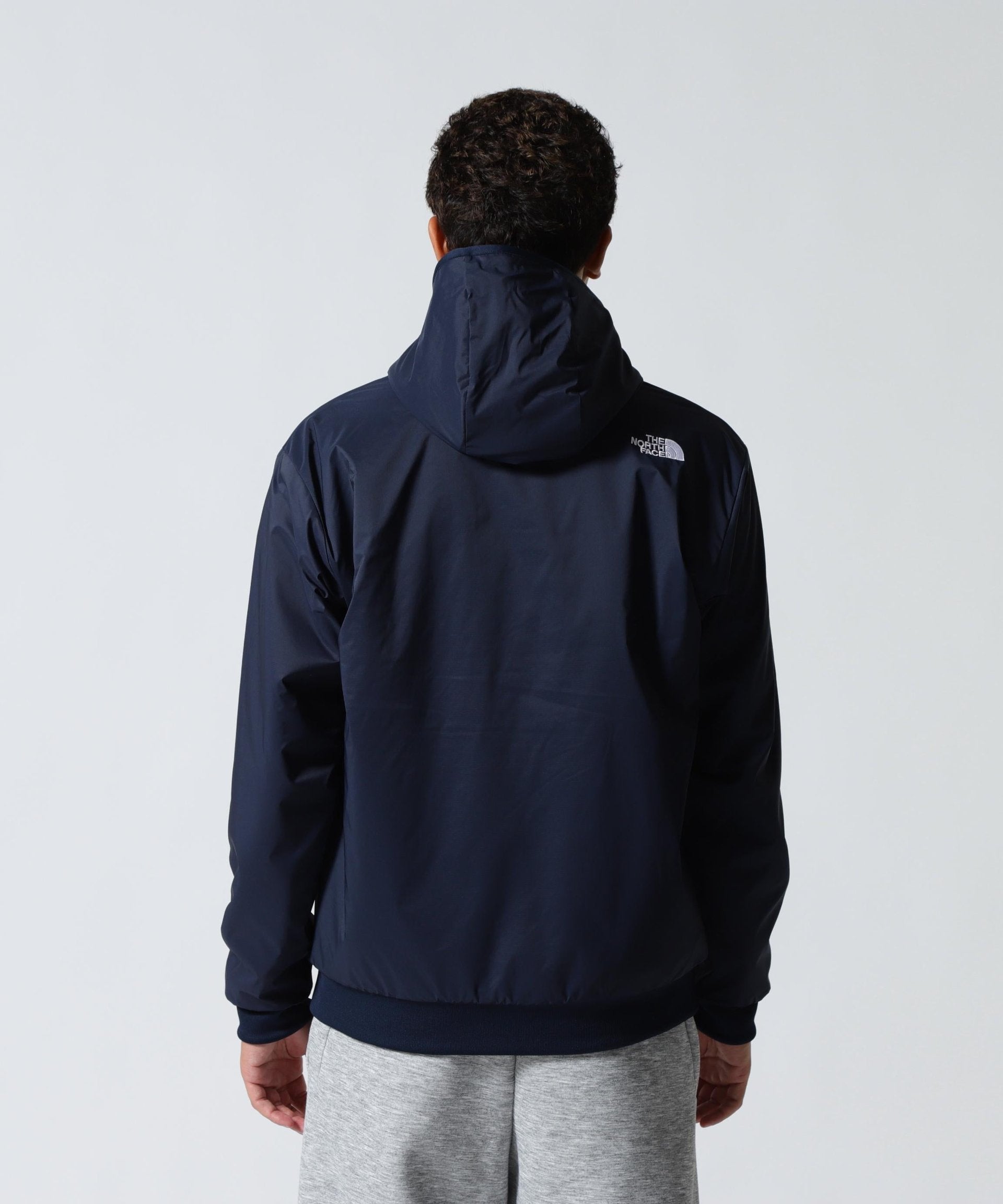 THE NORTH FACE (ザ・ノース・フェイス）reversible Teck Hoodie グレー