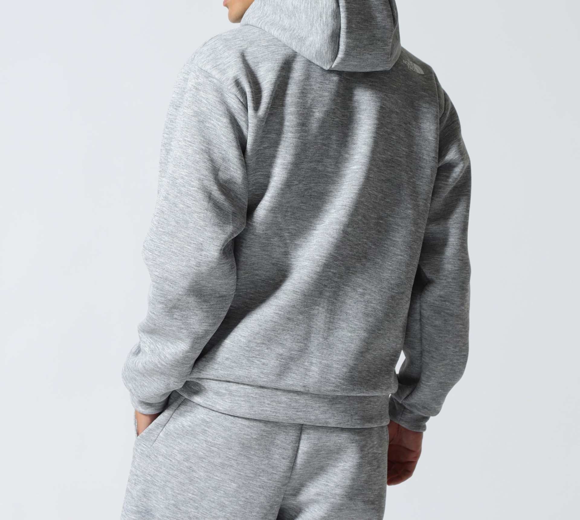 THE NORTH FACE (ザ・ノース・フェイス）reversible Teck Hoodie グレー