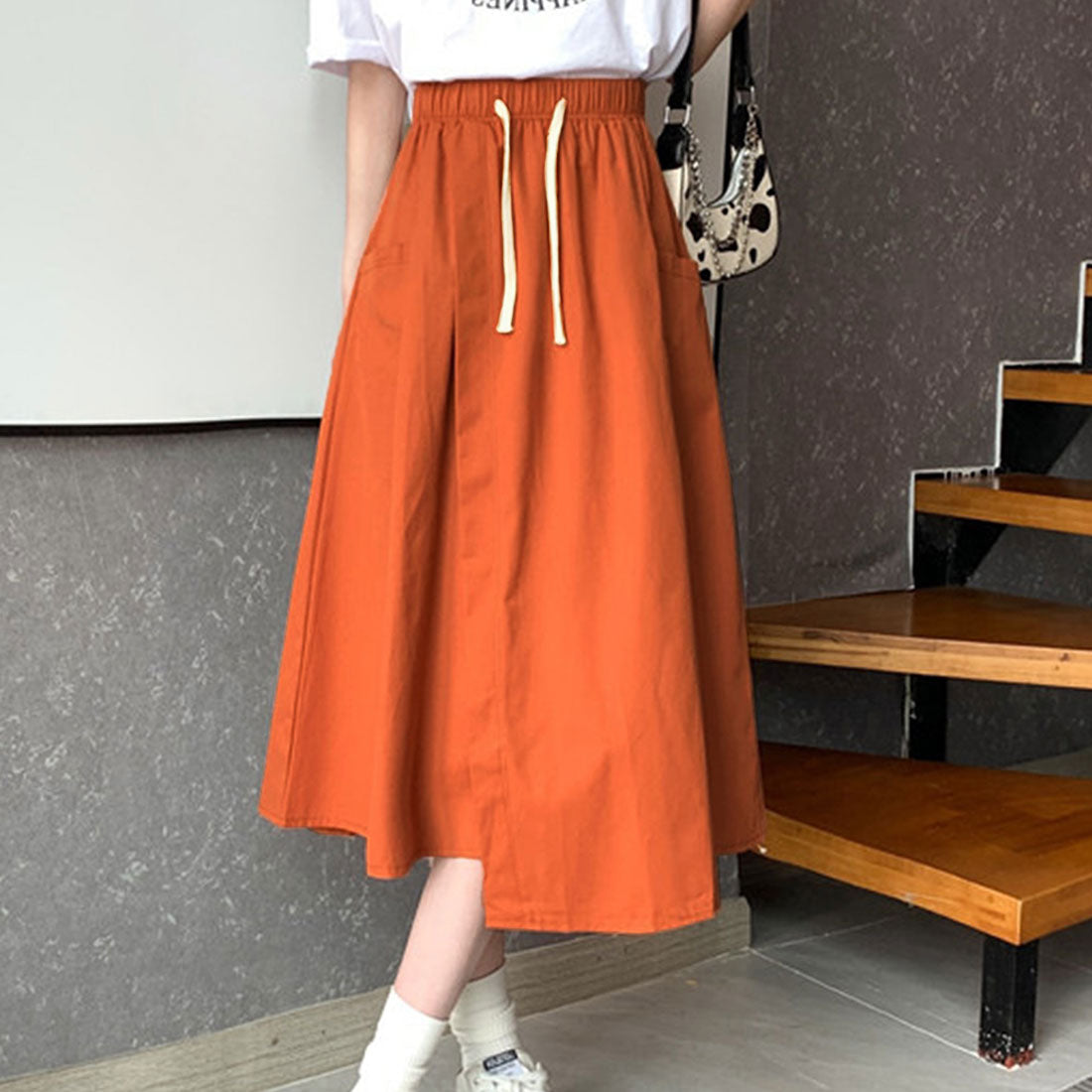 アミュレット Amulet ポケット付きフレアスカート レディース 10代 20代 30代 韓国ファッション 春 夏 秋 カジュアル かわいい おしゃれ シンプル ミモレ丈