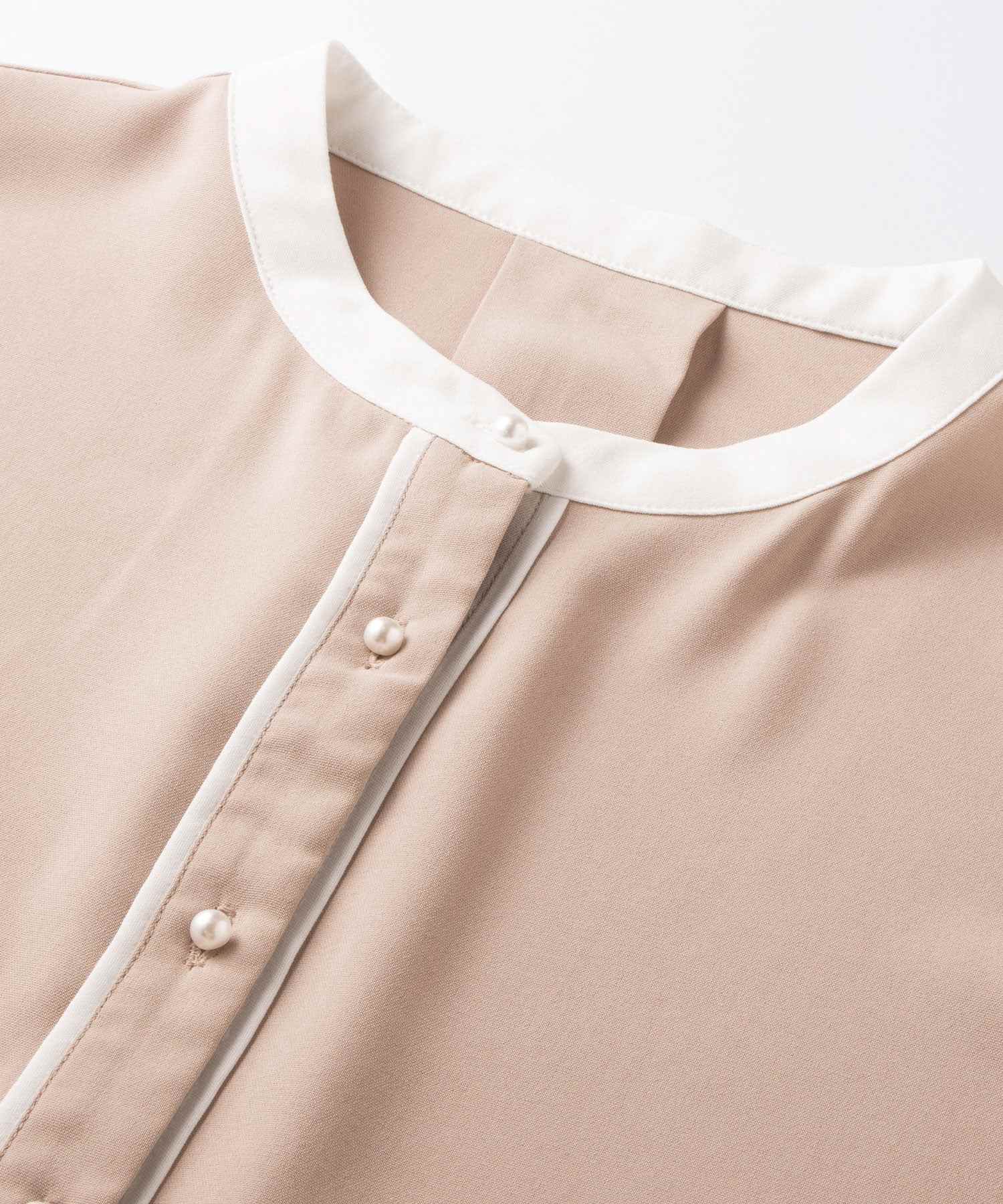 バイカラーパール調ボタンブラウス