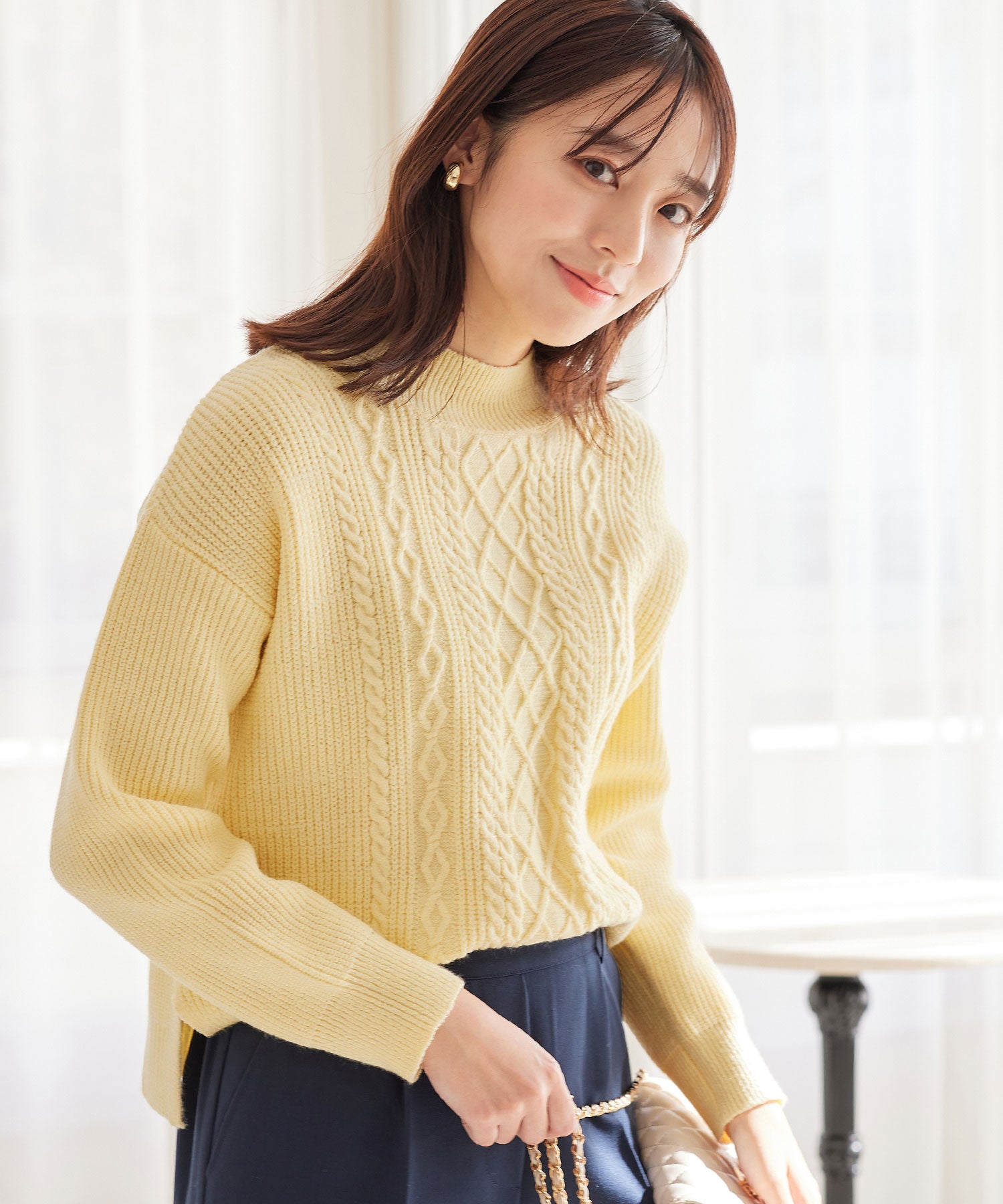 【毛玉になりにくい・静電気防止】ケーブル柄モックネックニット クリームイエロー