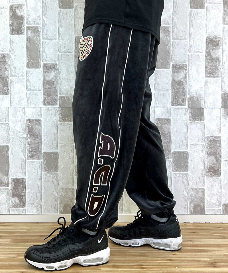 アヴィレックス AVIREX アヴィレックス VELOUR PANTS 'A.C.D' ベロア パンツ ジャージ サイドライン 刺繍 ロングパンツ イージーパンツ メンズ （ブラック） ブラック