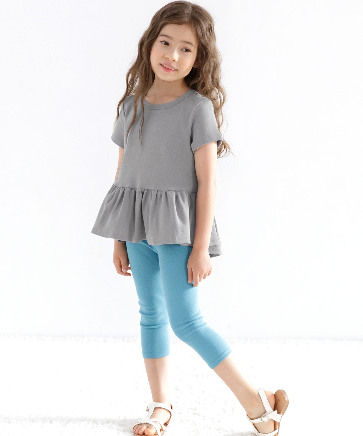 コドモフク ビー 子供服Bee ぺプラム型フリルトップス