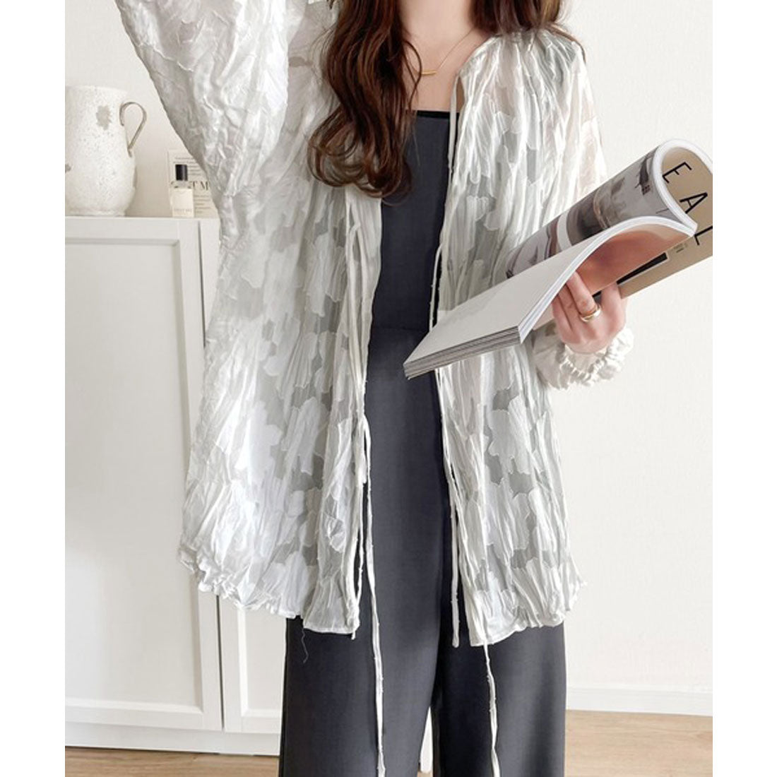 Classical Elf Elegant top with just the right amount of sheerness. Front and back 2-way volume sleeve ribbon sheer blouse.