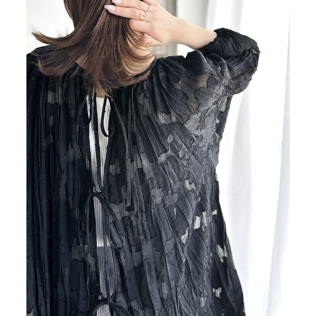 Classical Elf Elegant top with just the right amount of sheerness. Front and back 2-way volume sleeve ribbon sheer blouse.