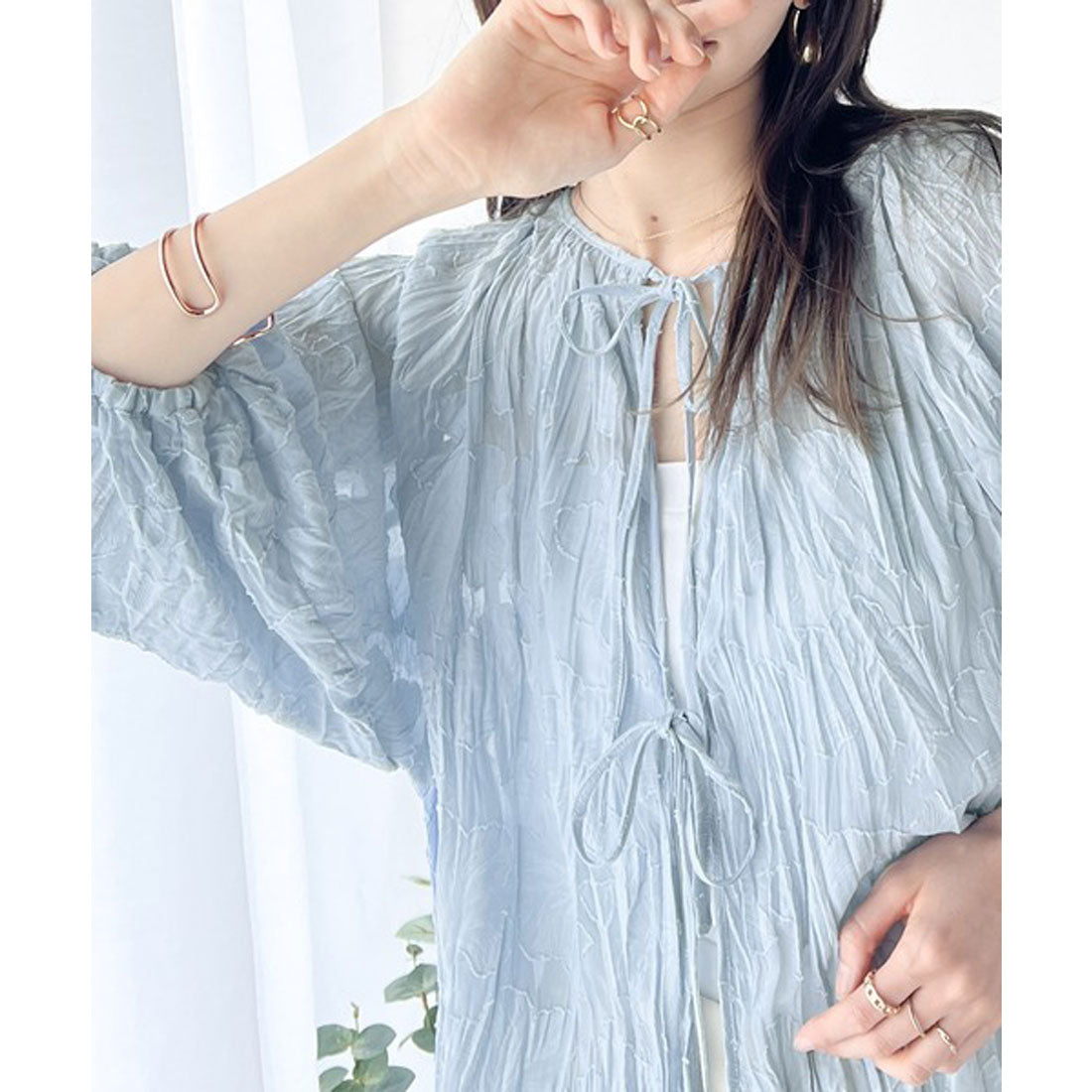 Classical Elf Elegant top with just the right amount of sheerness. Front and back 2-way volume sleeve ribbon sheer blouse.