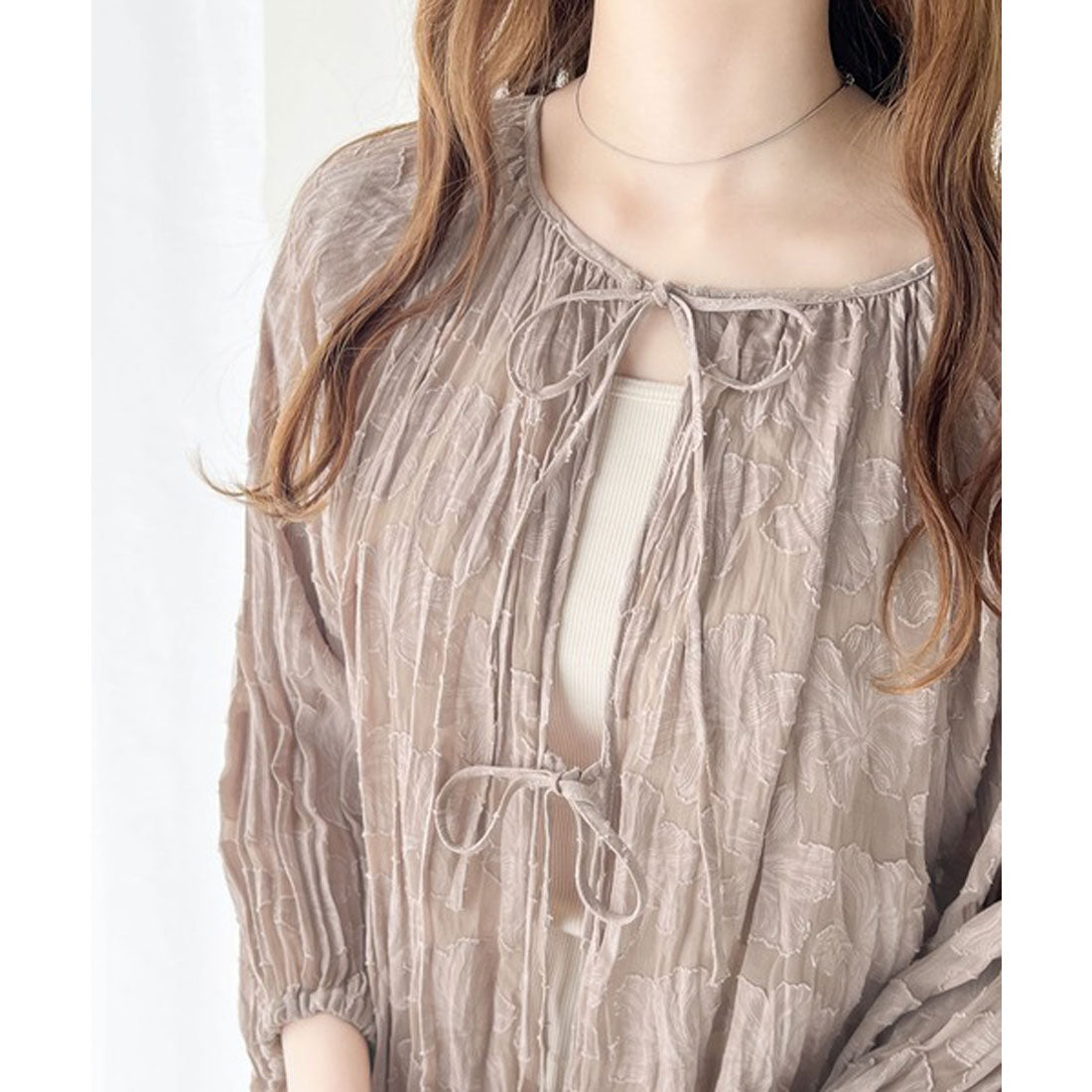 Classical Elf Elegant top with just the right amount of sheerness. Front and back 2-way volume sleeve ribbon sheer blouse.