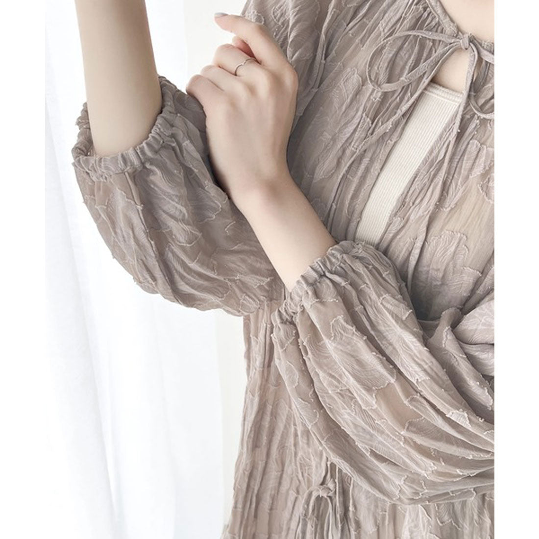 Classical Elf Elegant top with just the right amount of sheerness. Front and back 2-way volume sleeve ribbon sheer blouse.