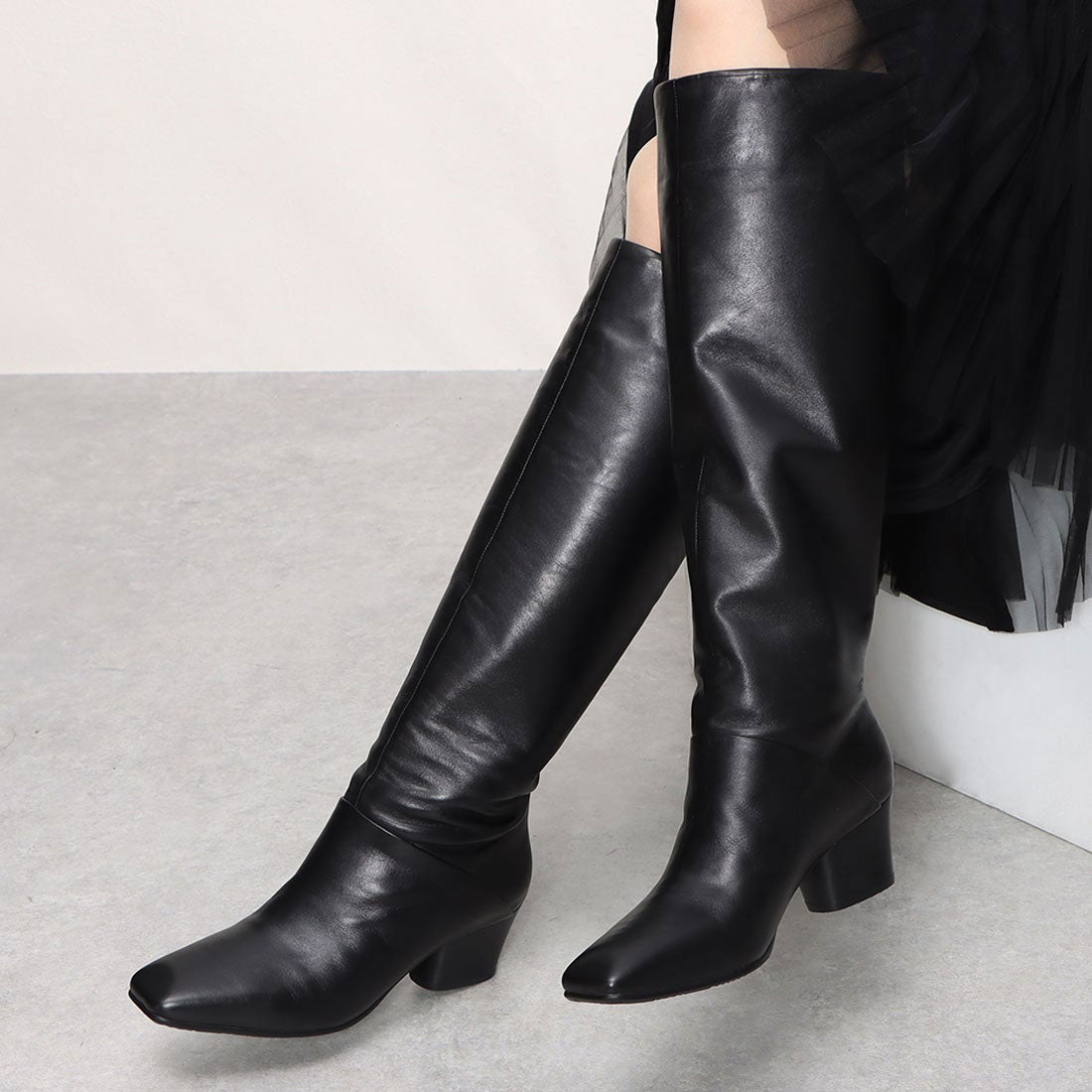 サヴァサヴァ cava cava くたっとたるむトレンドシルエット・ルーズロングブーツ