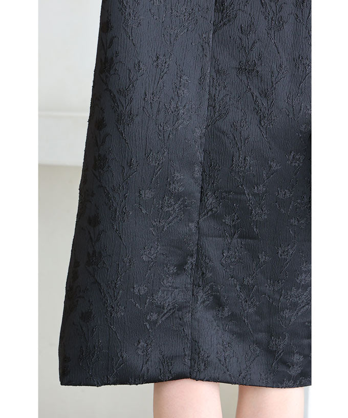 CAWAII CAWAII mini dress with a floral pattern that stands out in the light.