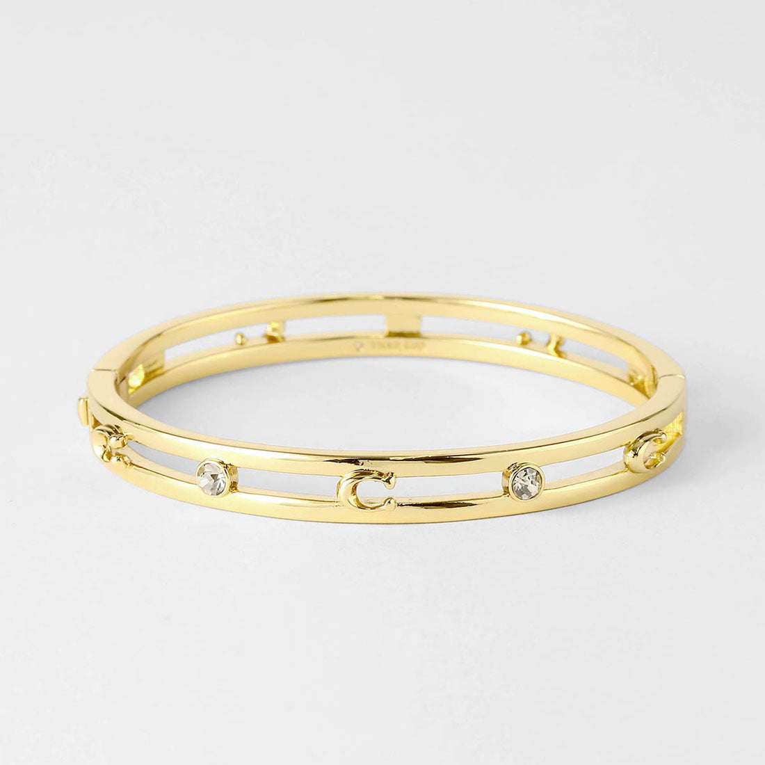 コーチ COACH ブレスレット ペグド シグネチャー ヒンジド バングル 506208 GLD710 （シャイニーゴールド） シャイニーゴールド