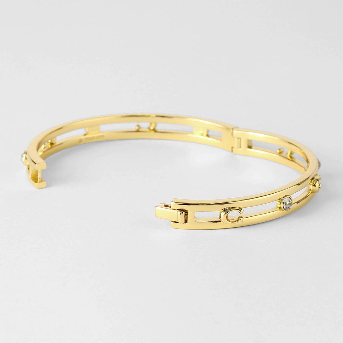 コーチ COACH ブレスレット ペグド シグネチャー ヒンジド バングル 506208 GLD710 （シャイニーゴールド） シャイニーゴールド