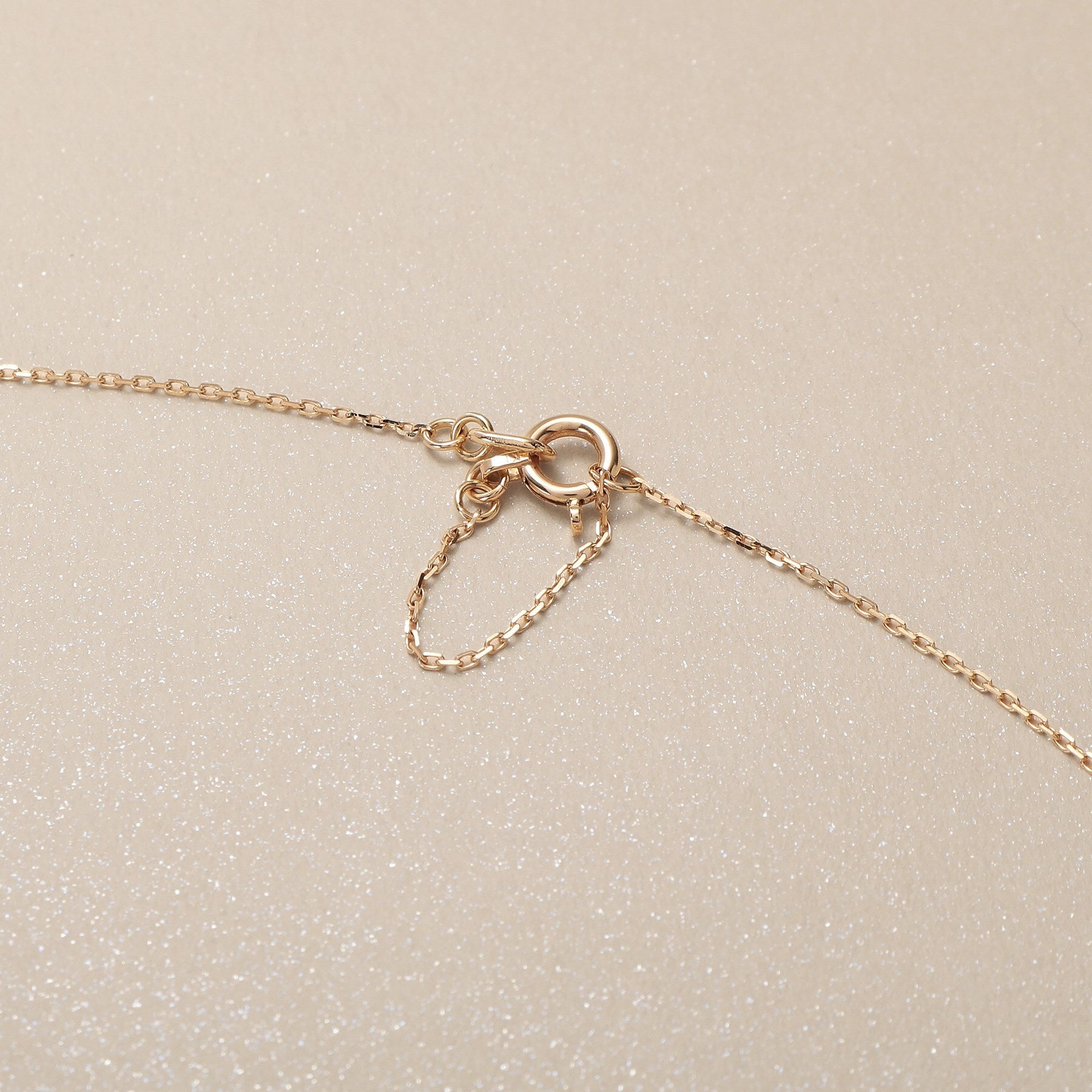 ココシュニック COCOSHNIK K10ダイヤモンド アシンメトリークロス ネックレス （アイボリー(104)） アイボリー(104)