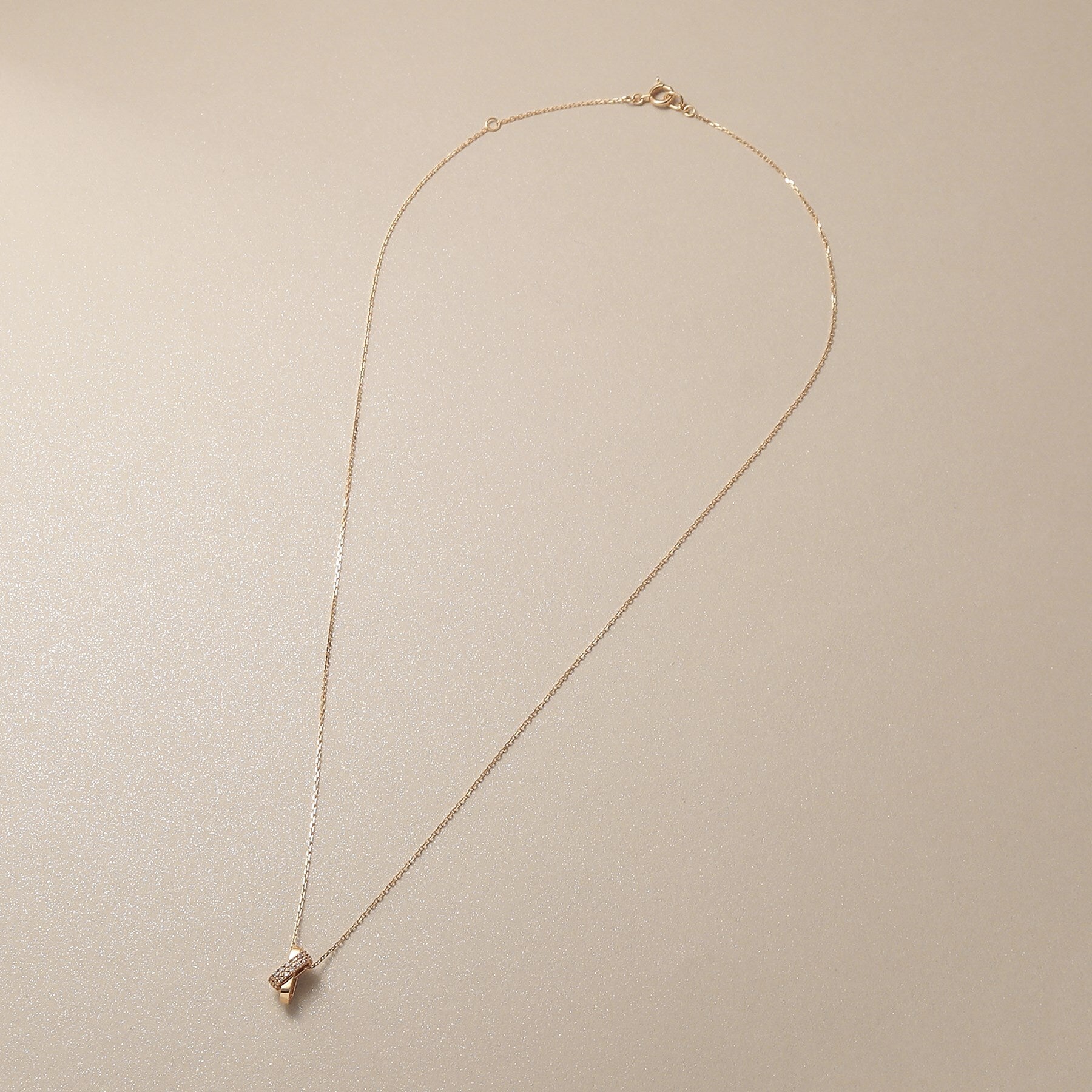 ココシュニック COCOSHNIK K10ダイヤモンド アシンメトリークロス ネックレス （アイボリー(104)） アイボリー(104)