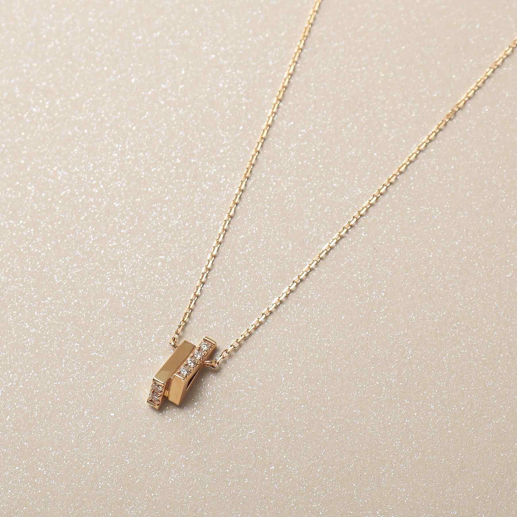 ココシュニック COCOSHNIK K10ダイヤモンド トライアングルシェイプ ネックレス （アイボリー(104)） アイボリー(104)